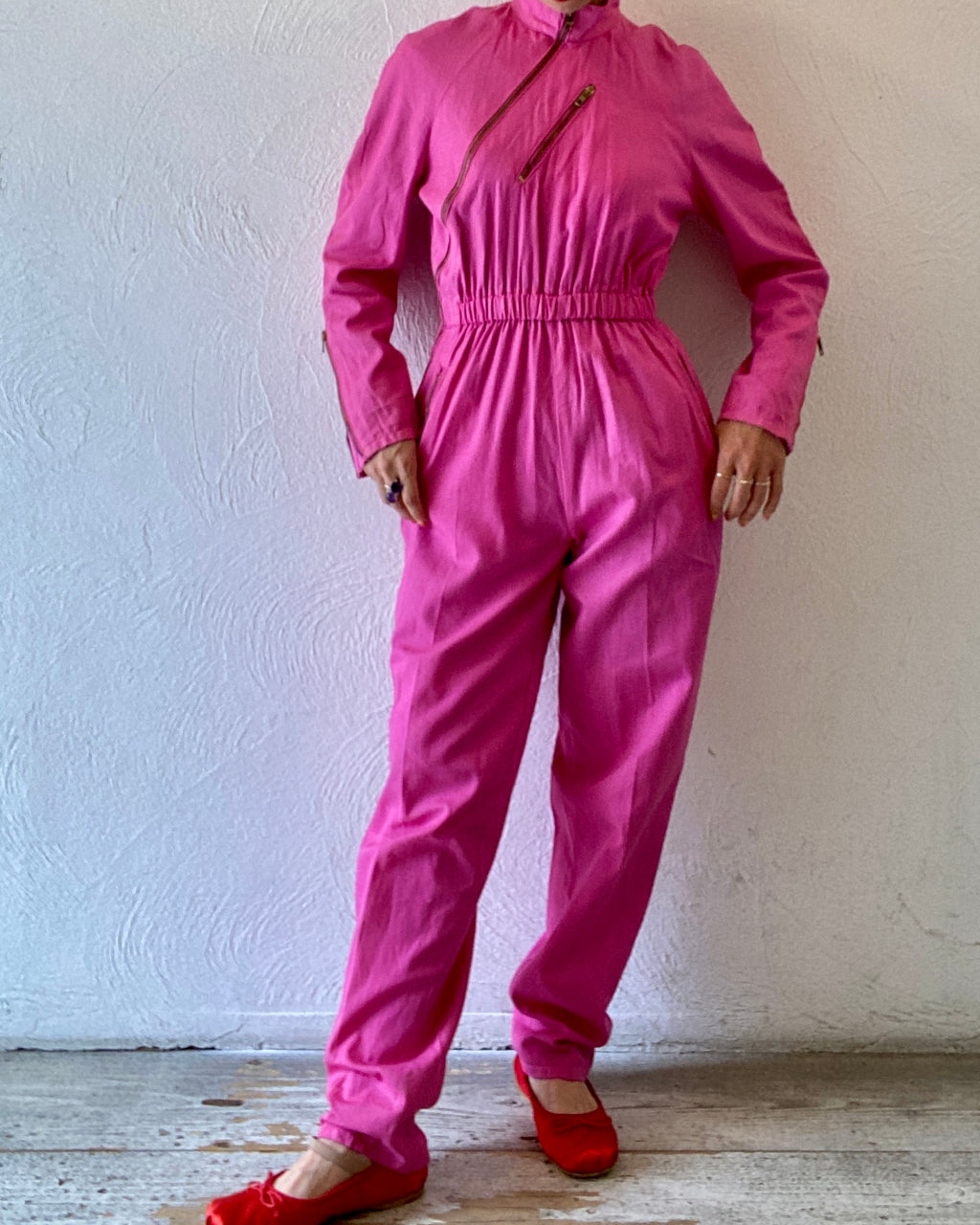 zip pink jump suit