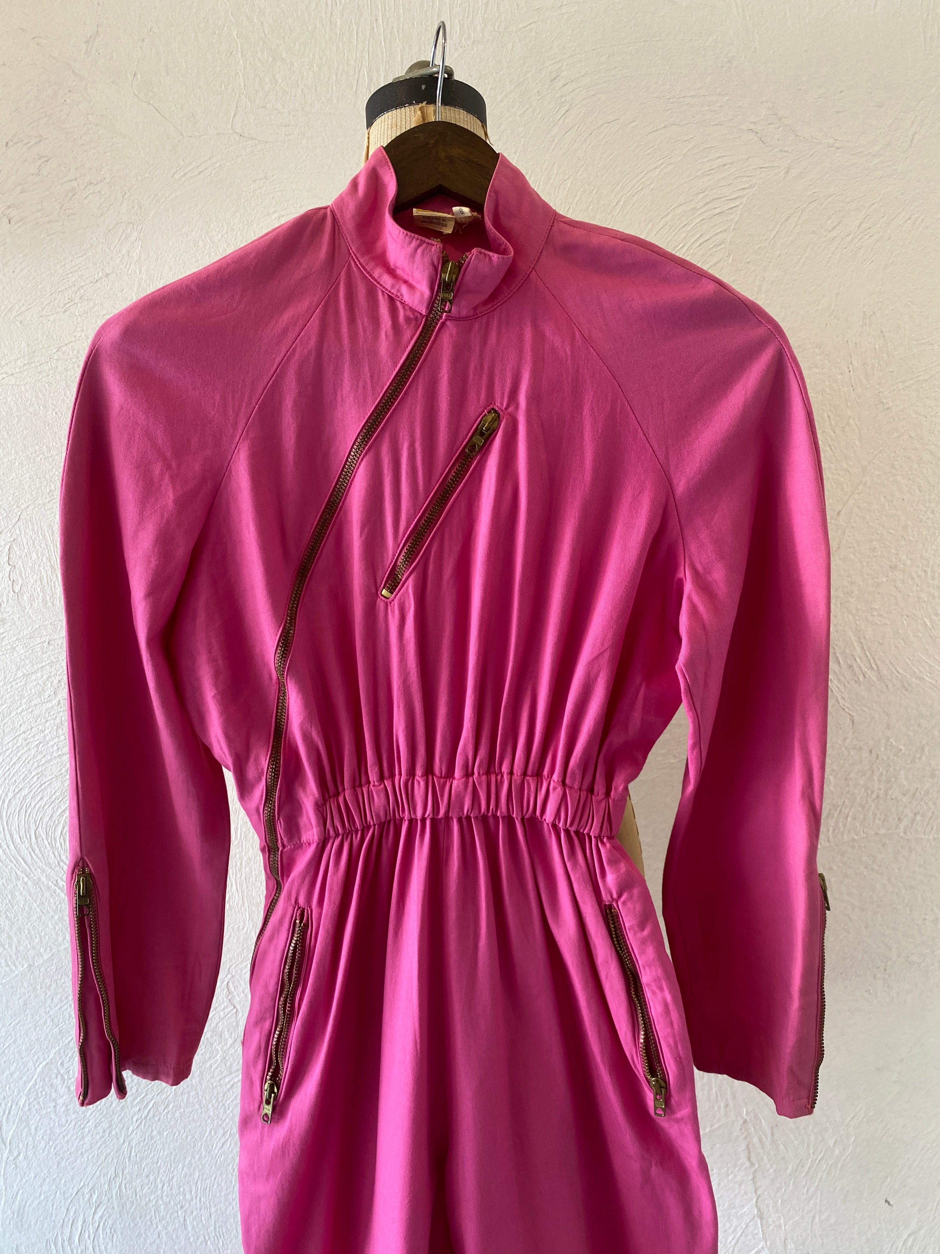 zip pink jump suit