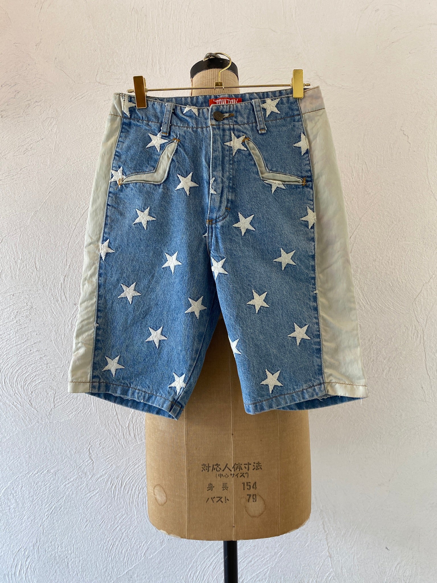 star embroidery denim pants