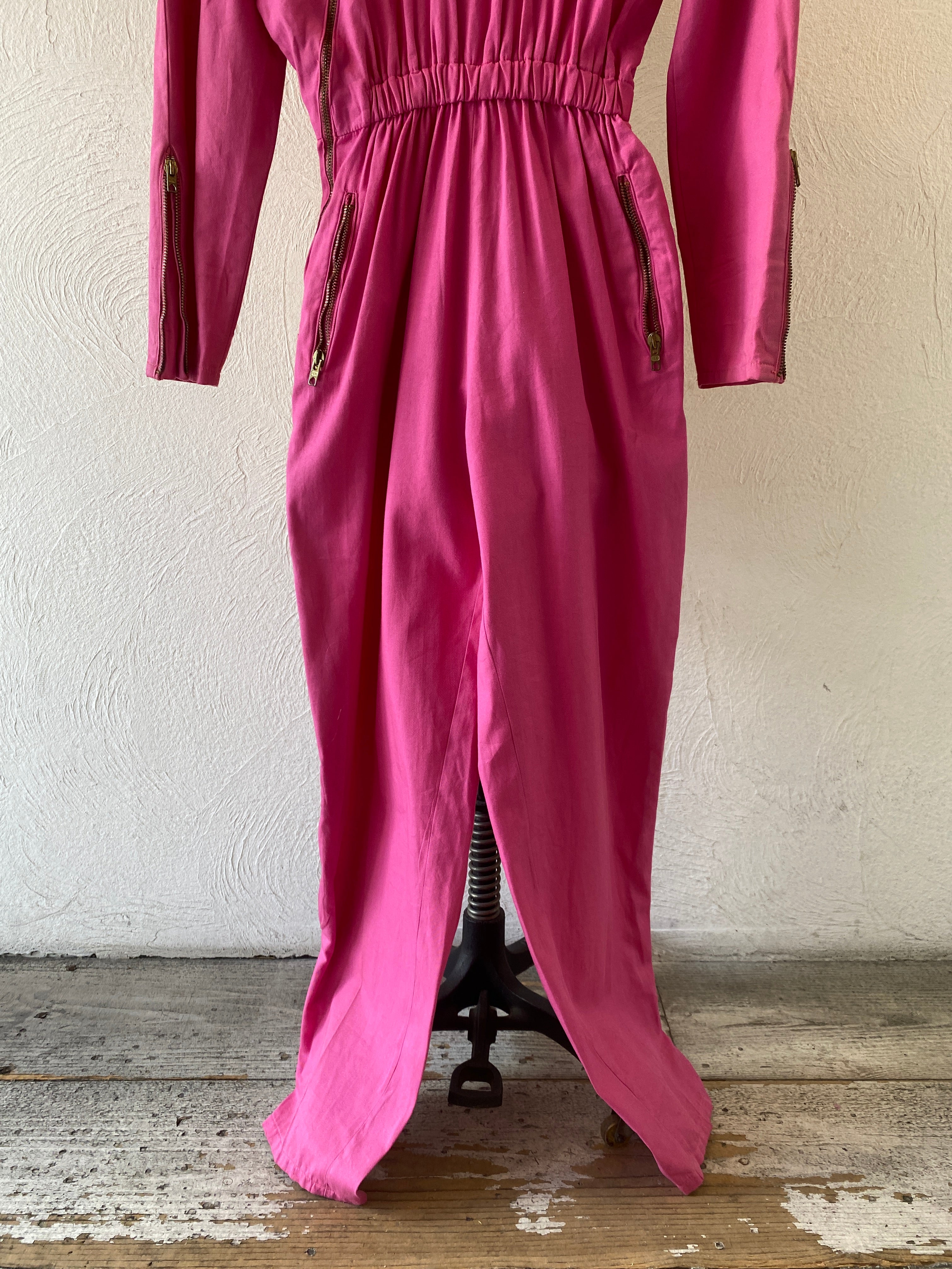 zip pink jump suit