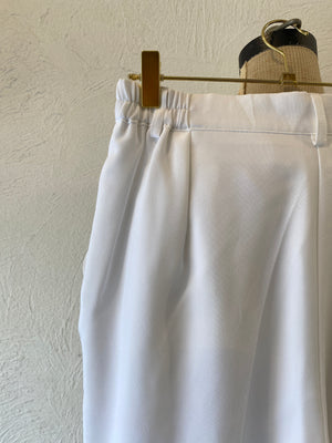 white tuck pants