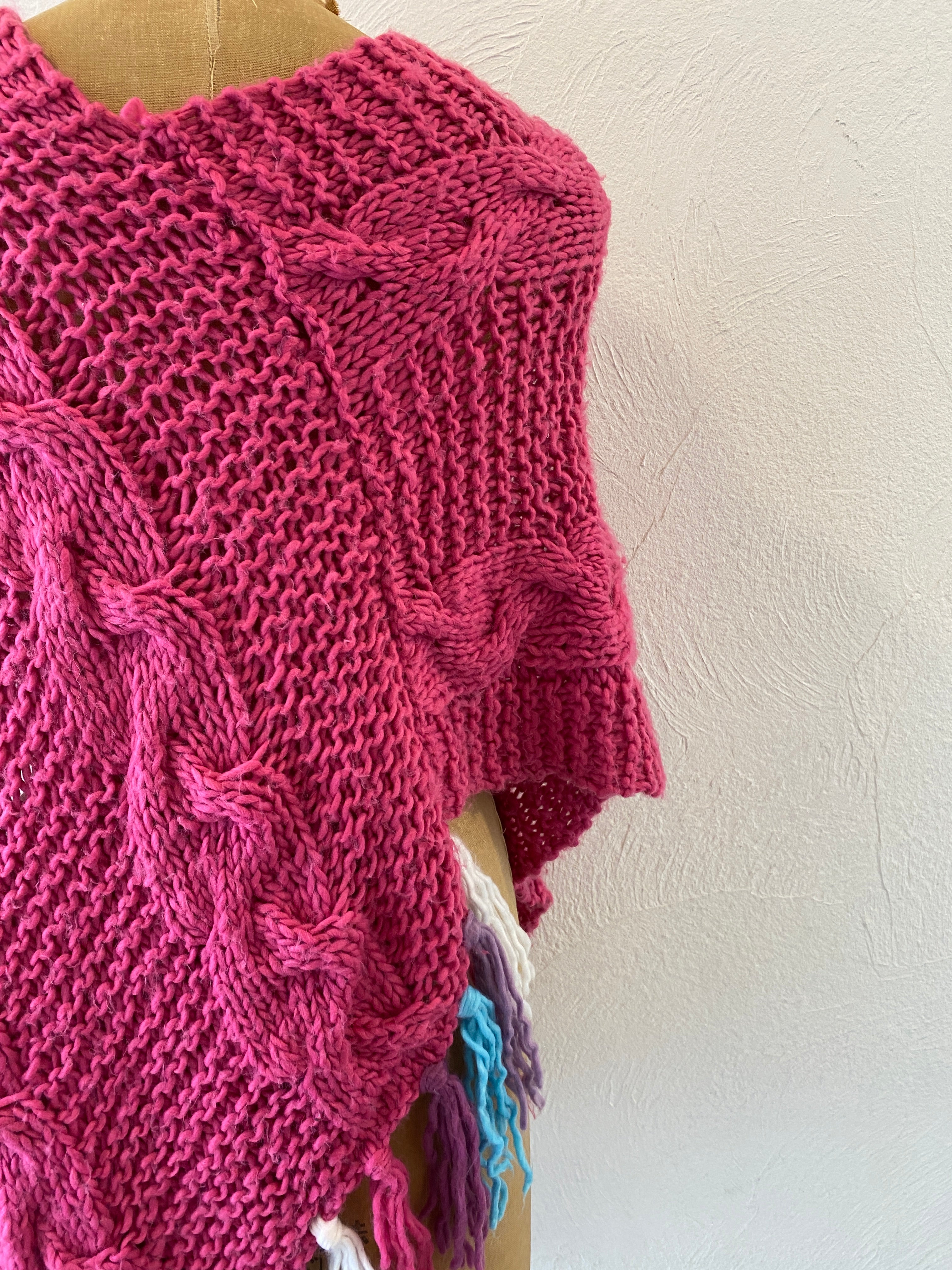 pink knit poncho