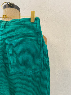 green corduroy pants