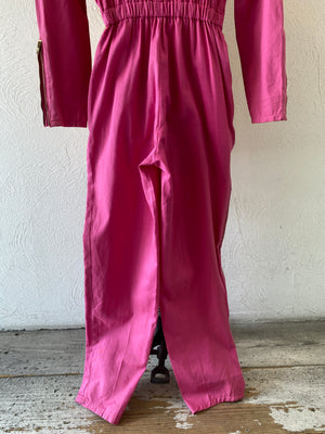 zip pink jump suit