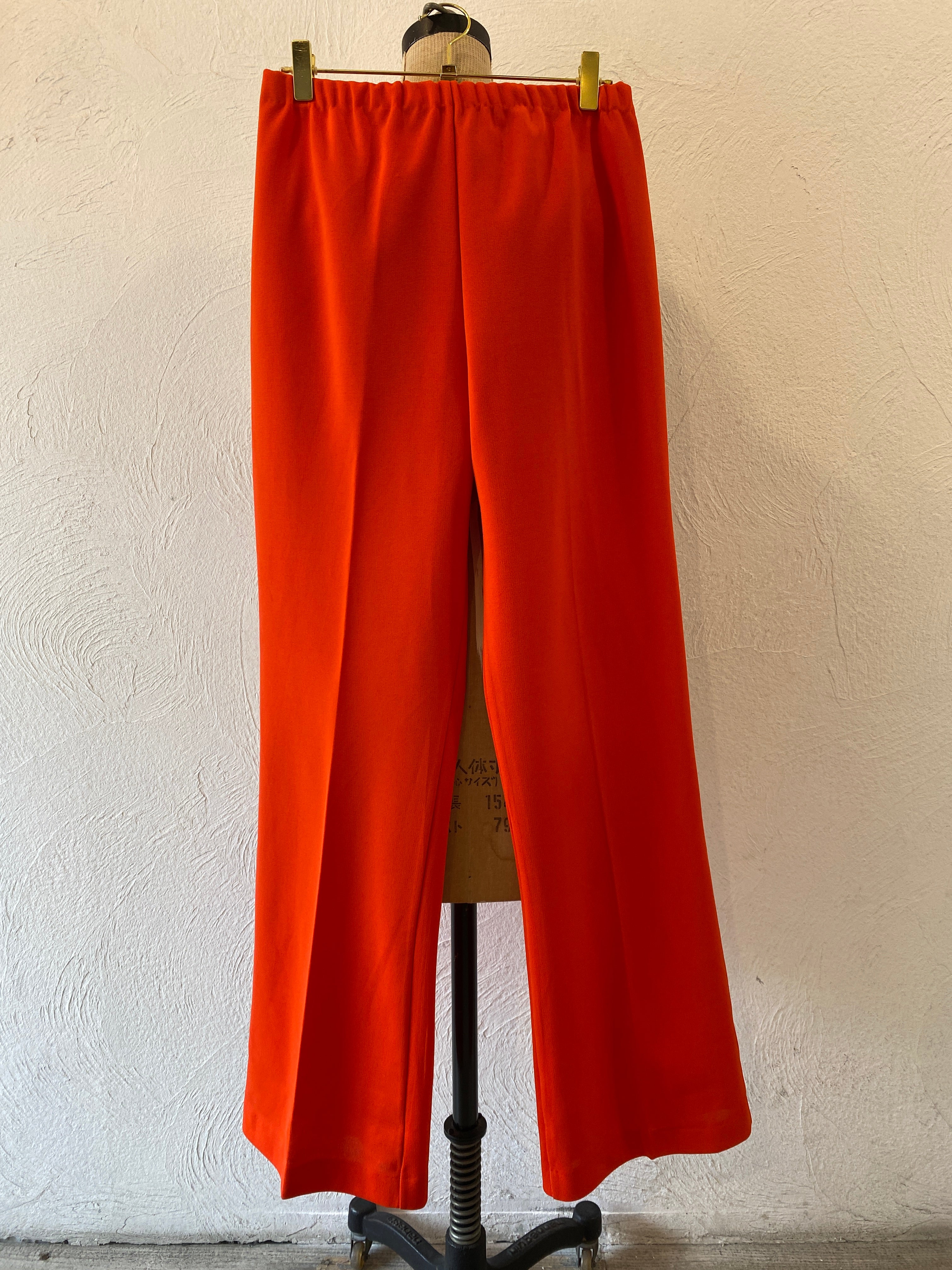 orange ester pants