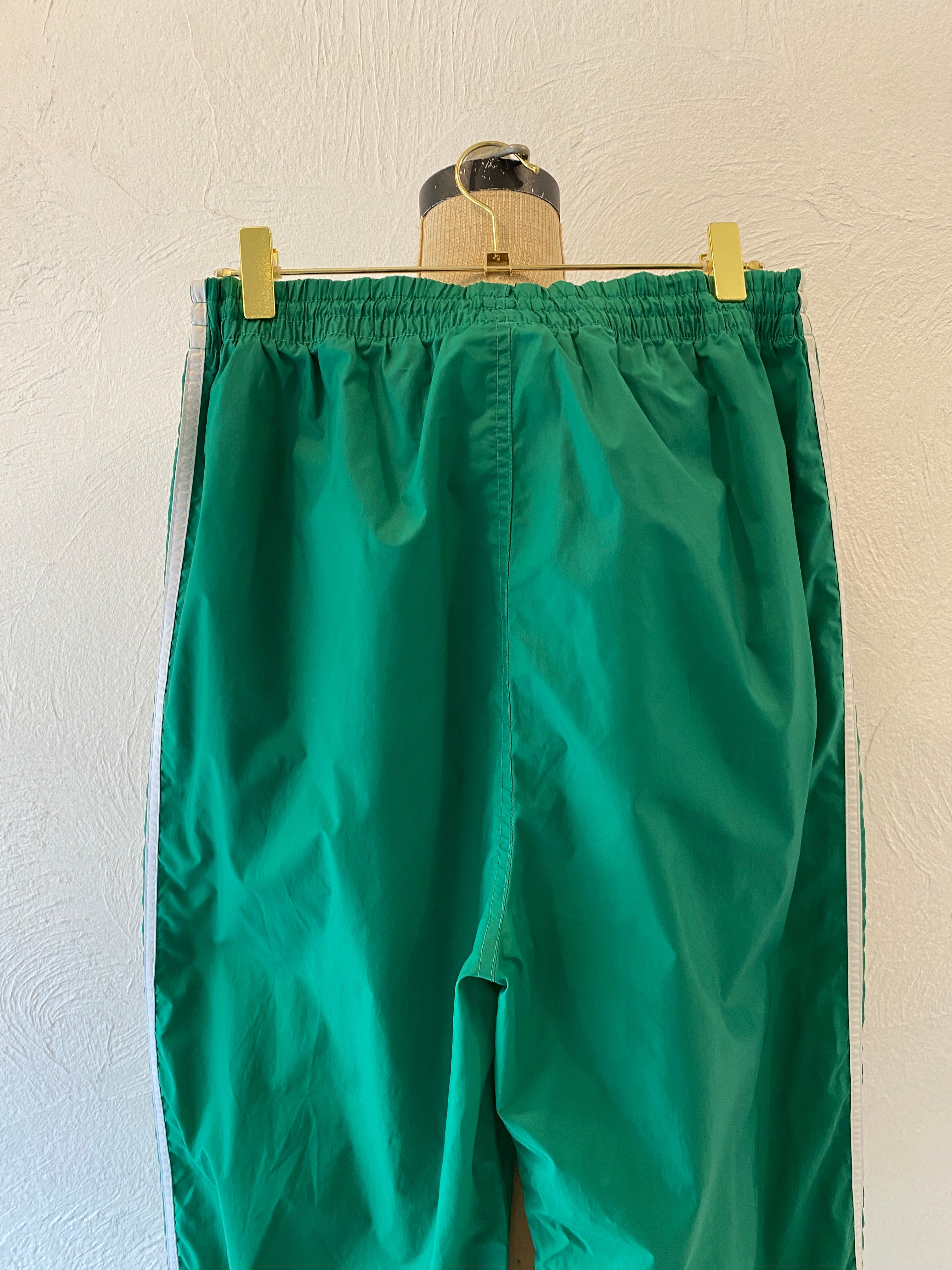green adidas nylon pants