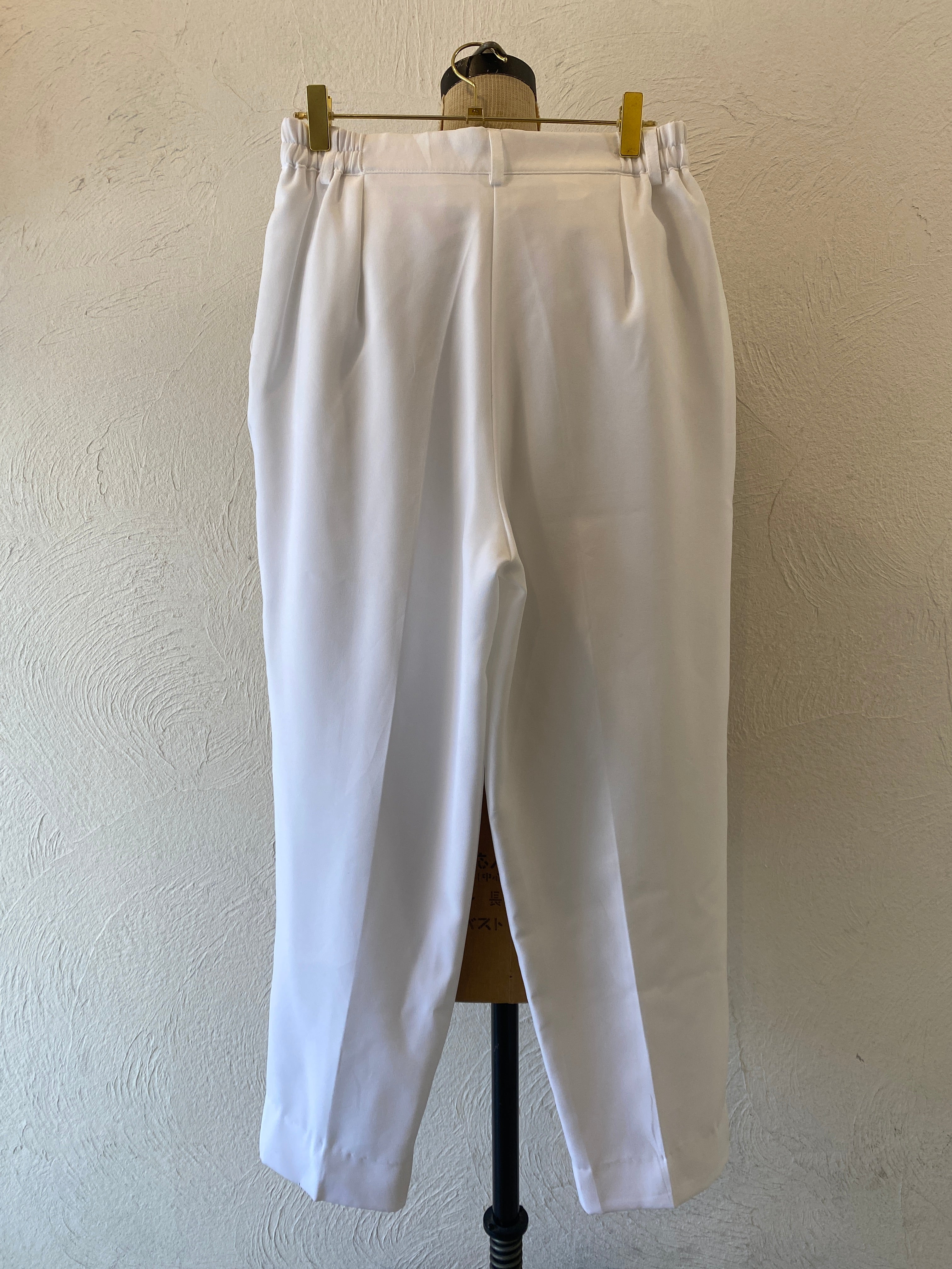 white tuck pants