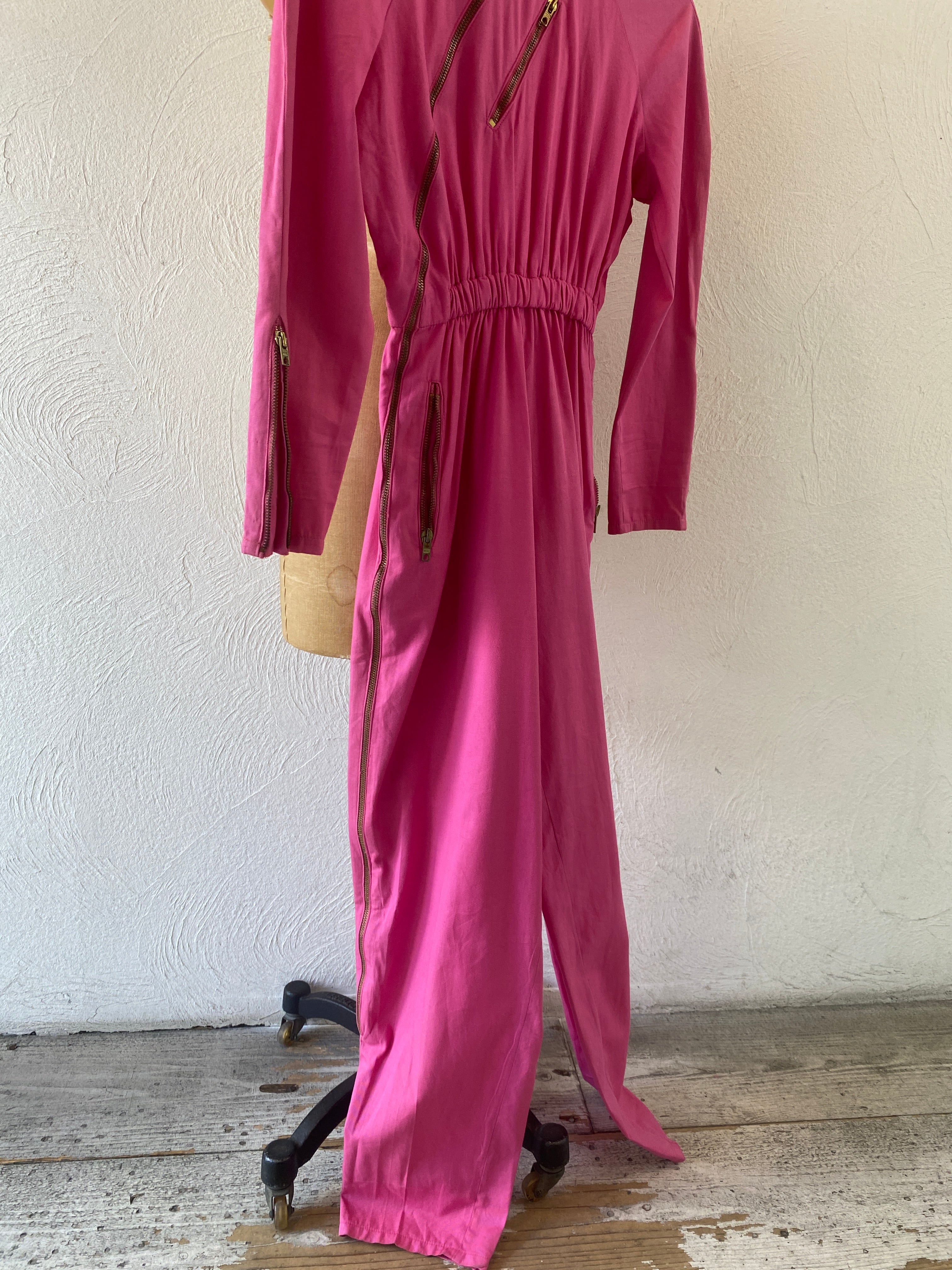 zip pink jump suit