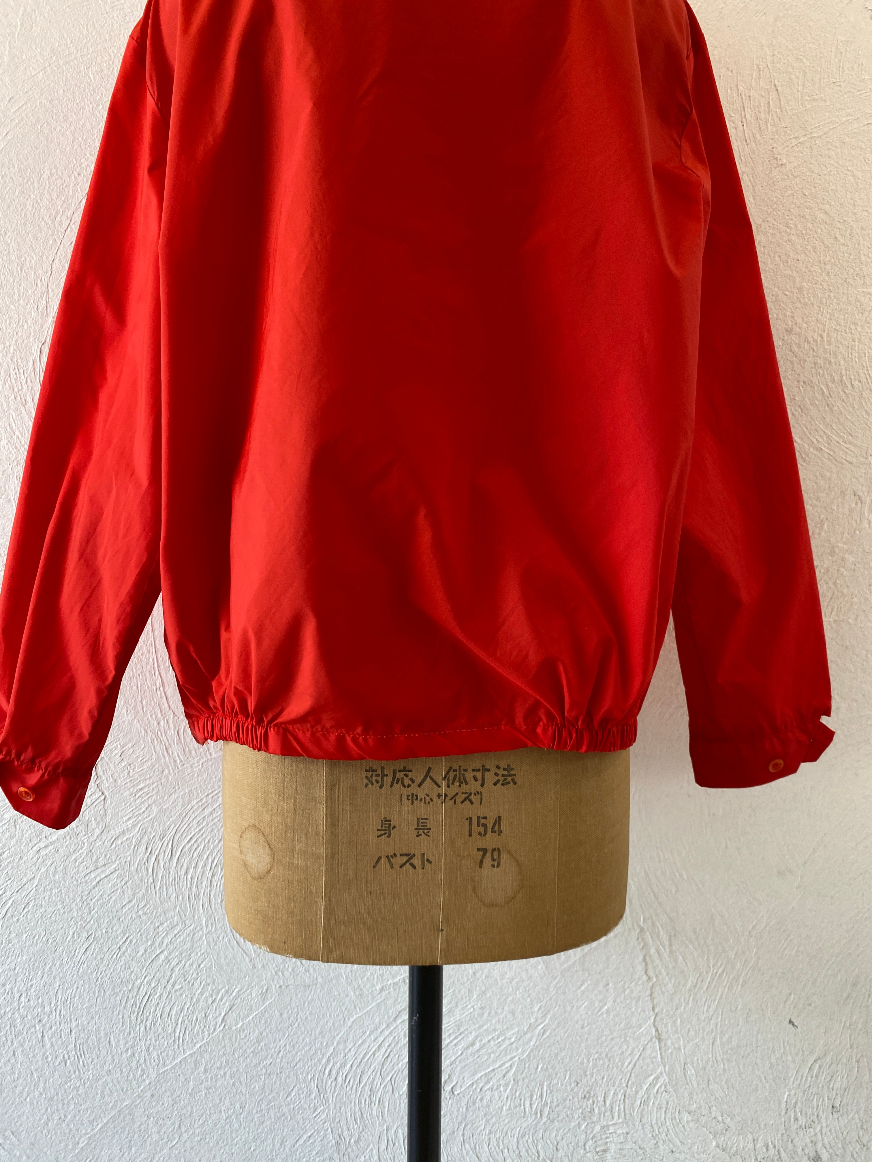 red nylon jacket