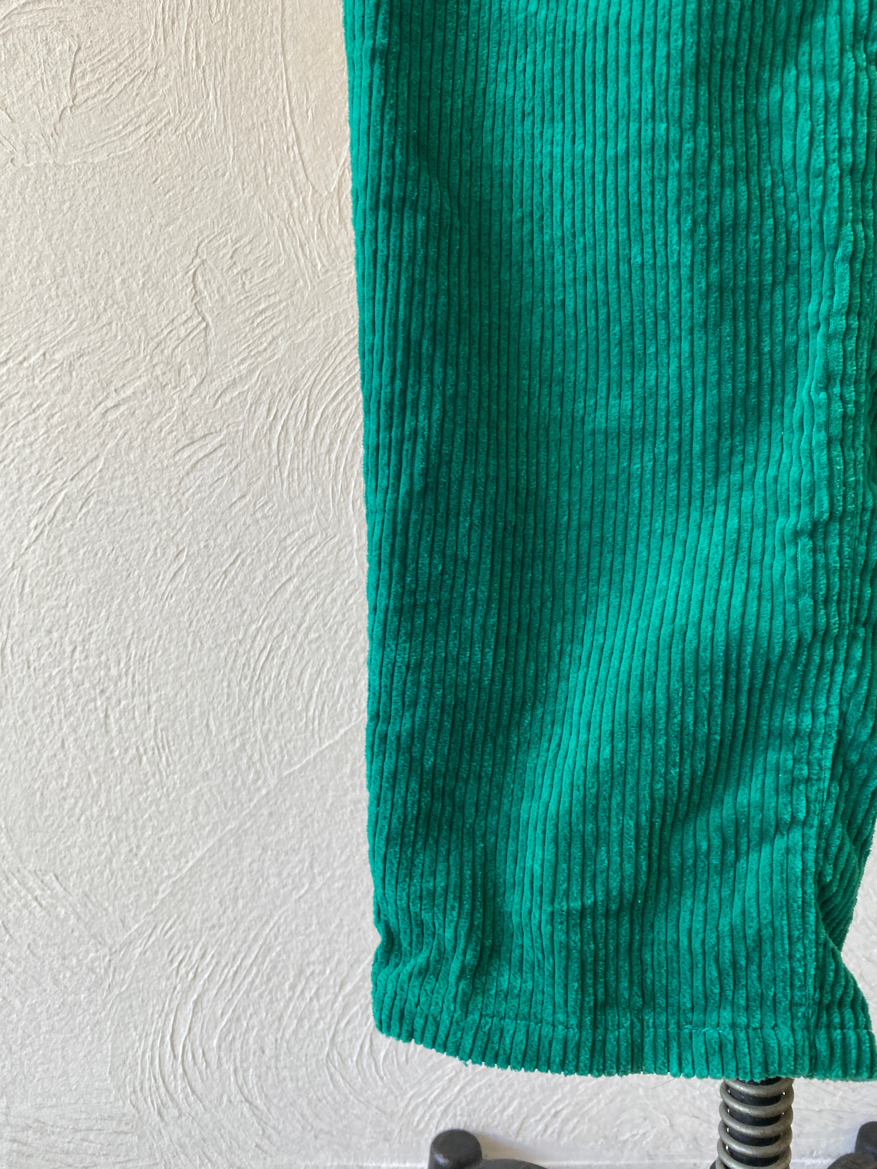 green corduroy pants