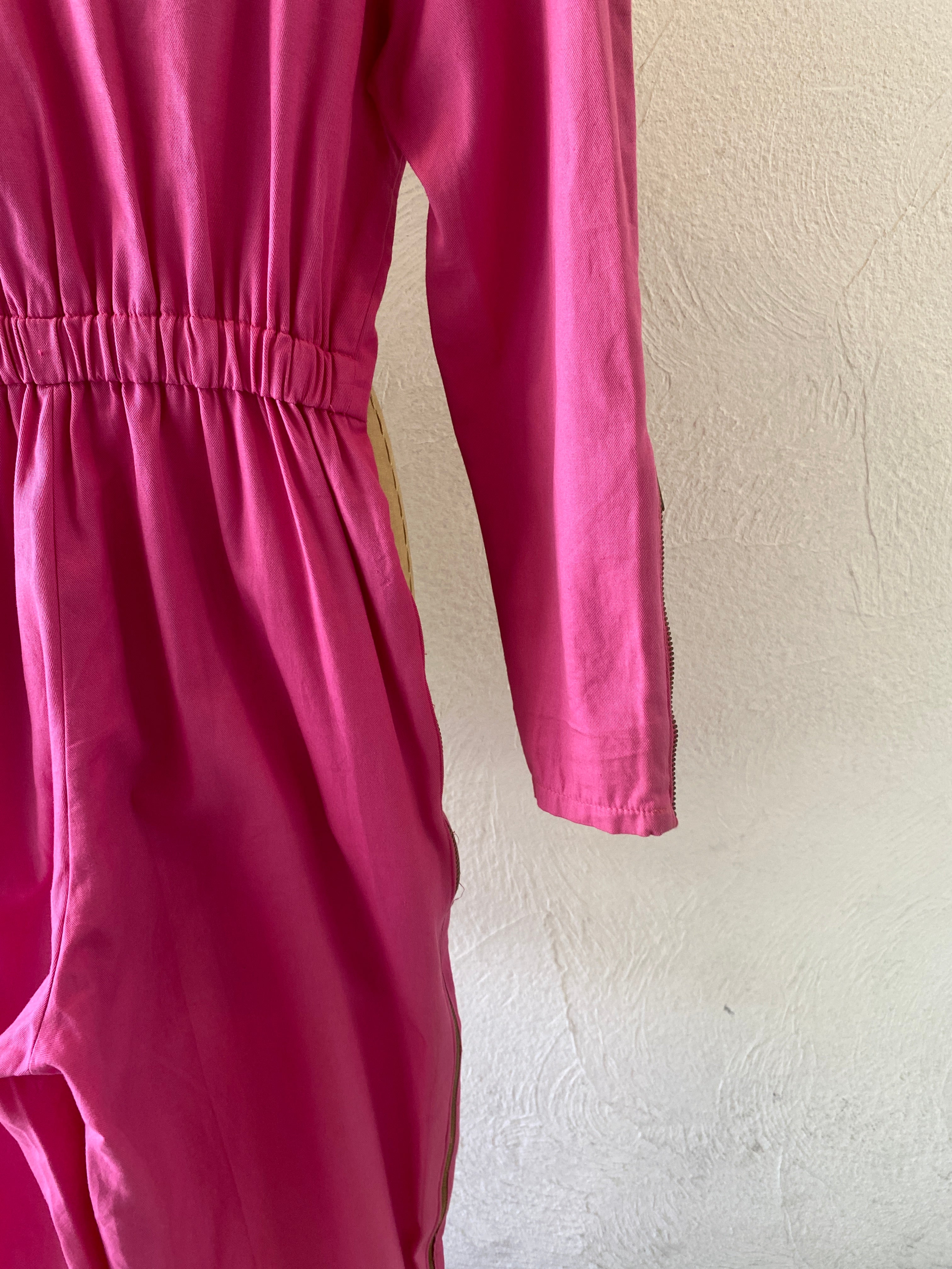 zip pink jump suit