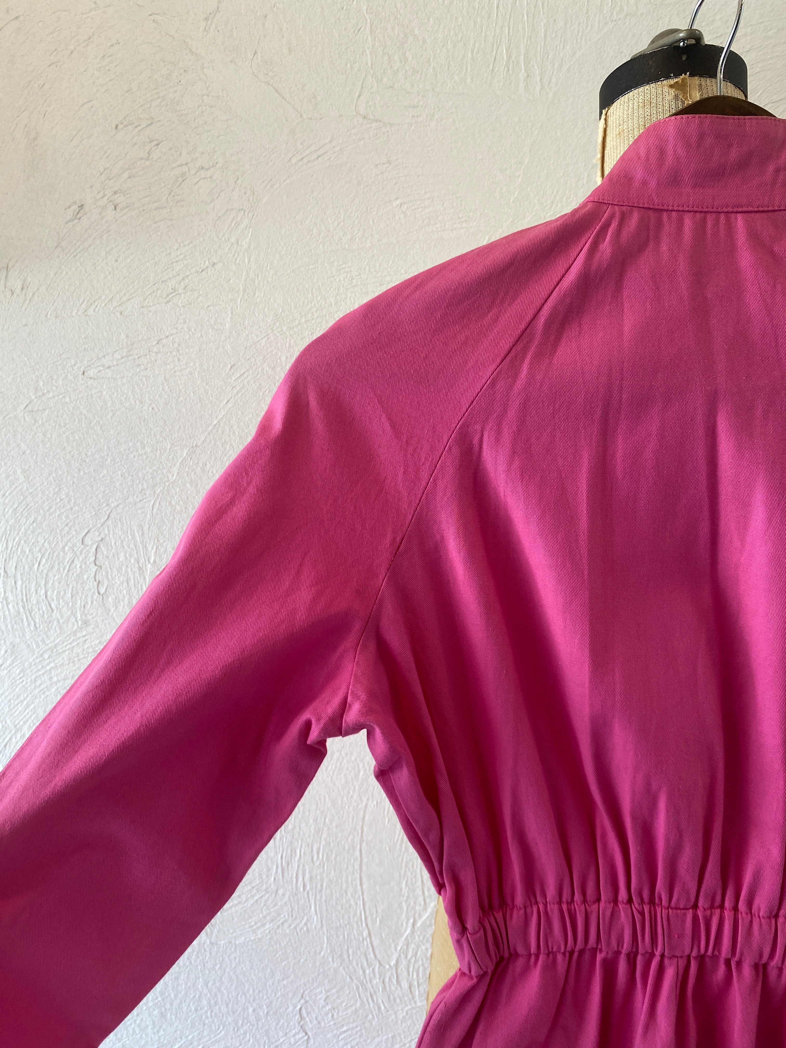 zip pink jump suit