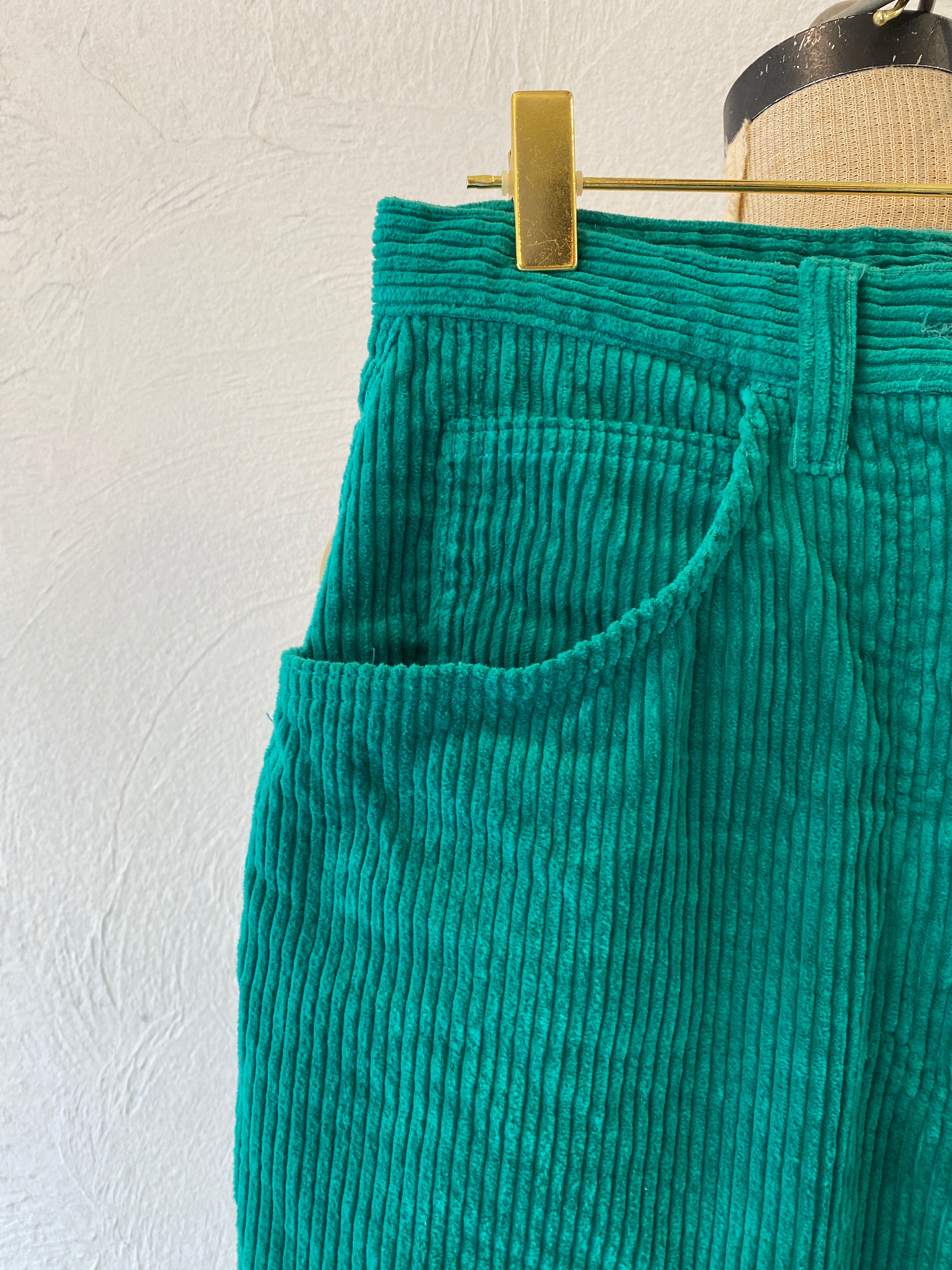 green corduroy pants