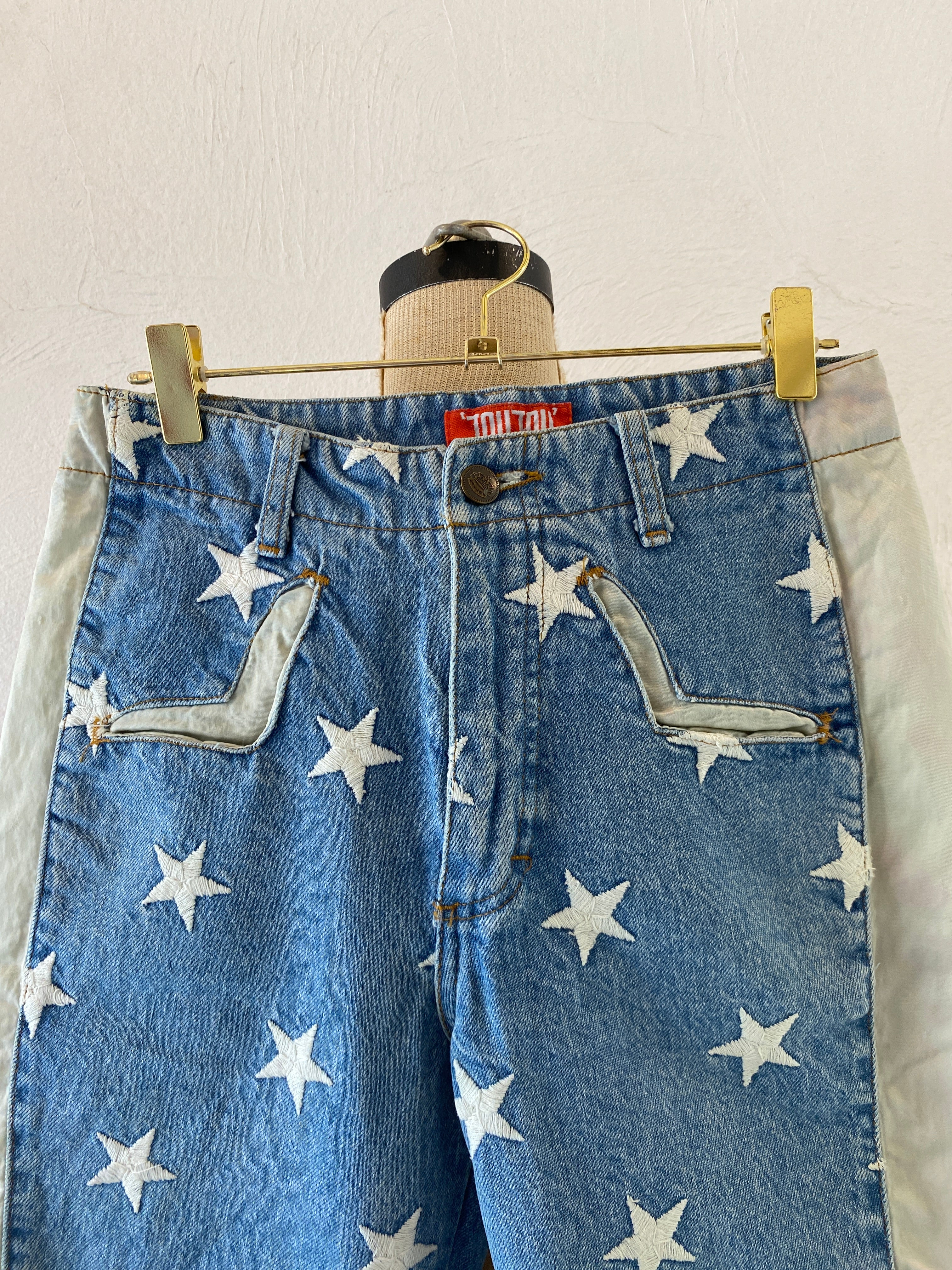 star embroidery denim pants