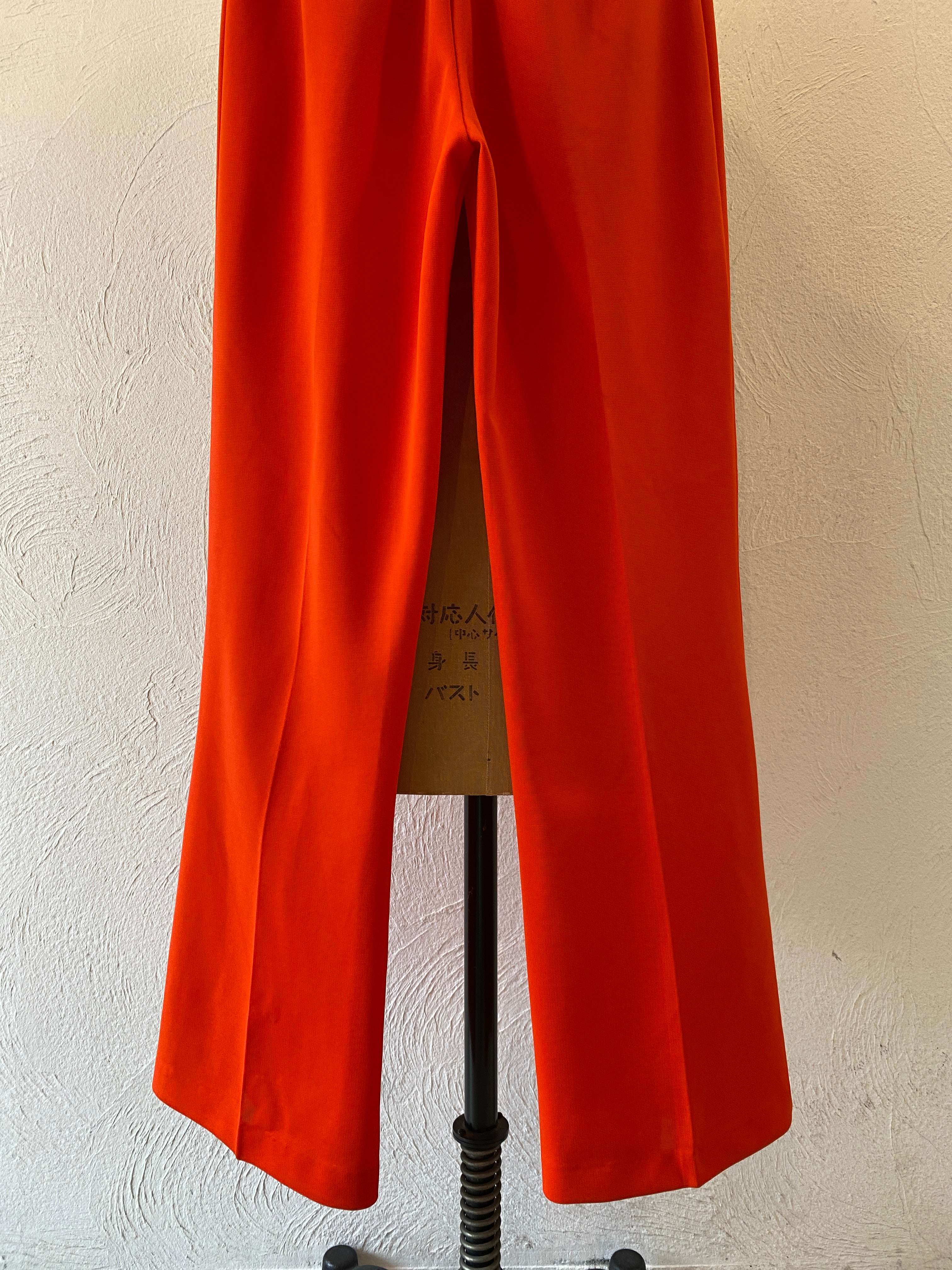 orange ester pants