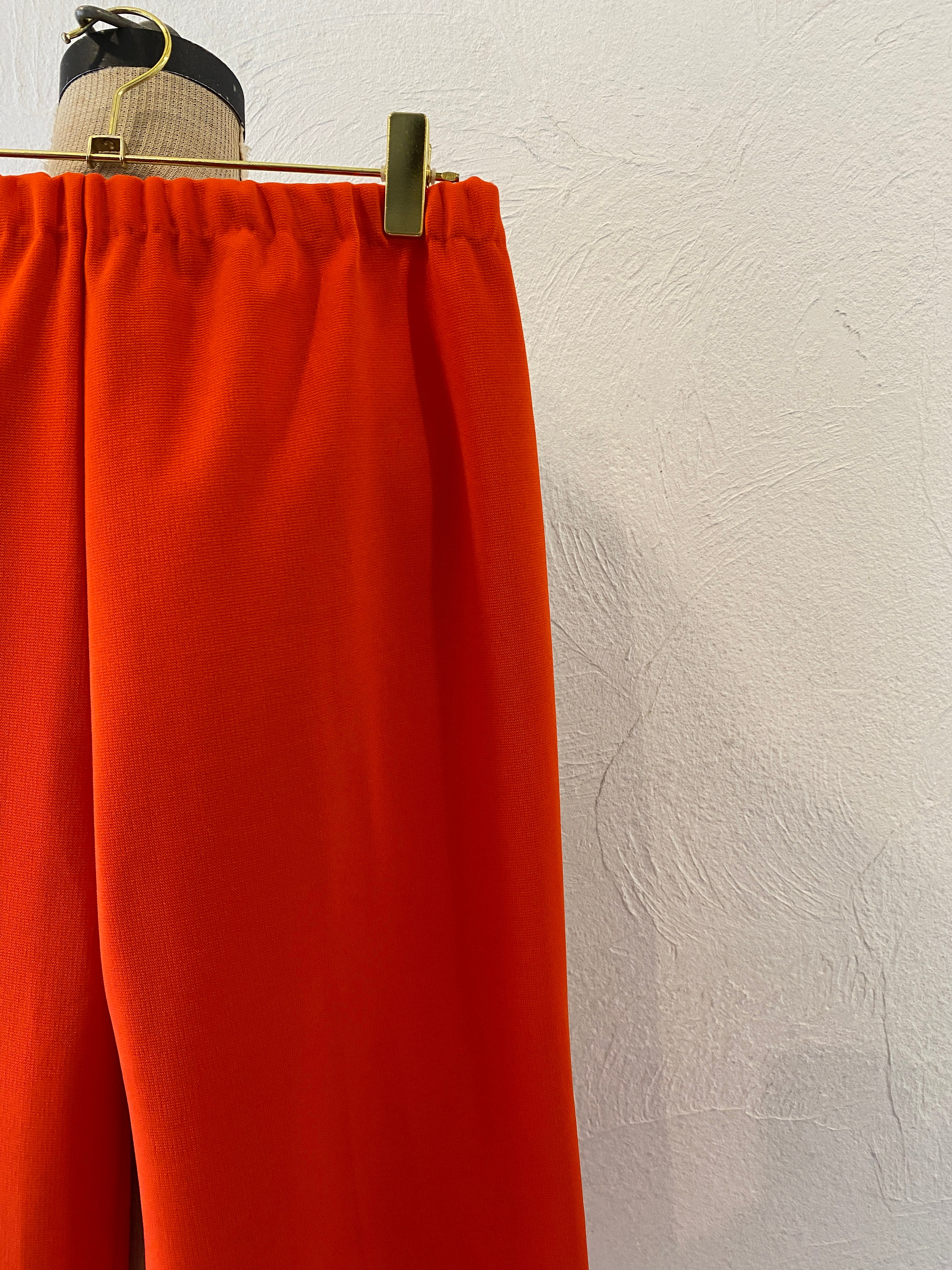 orange ester pants