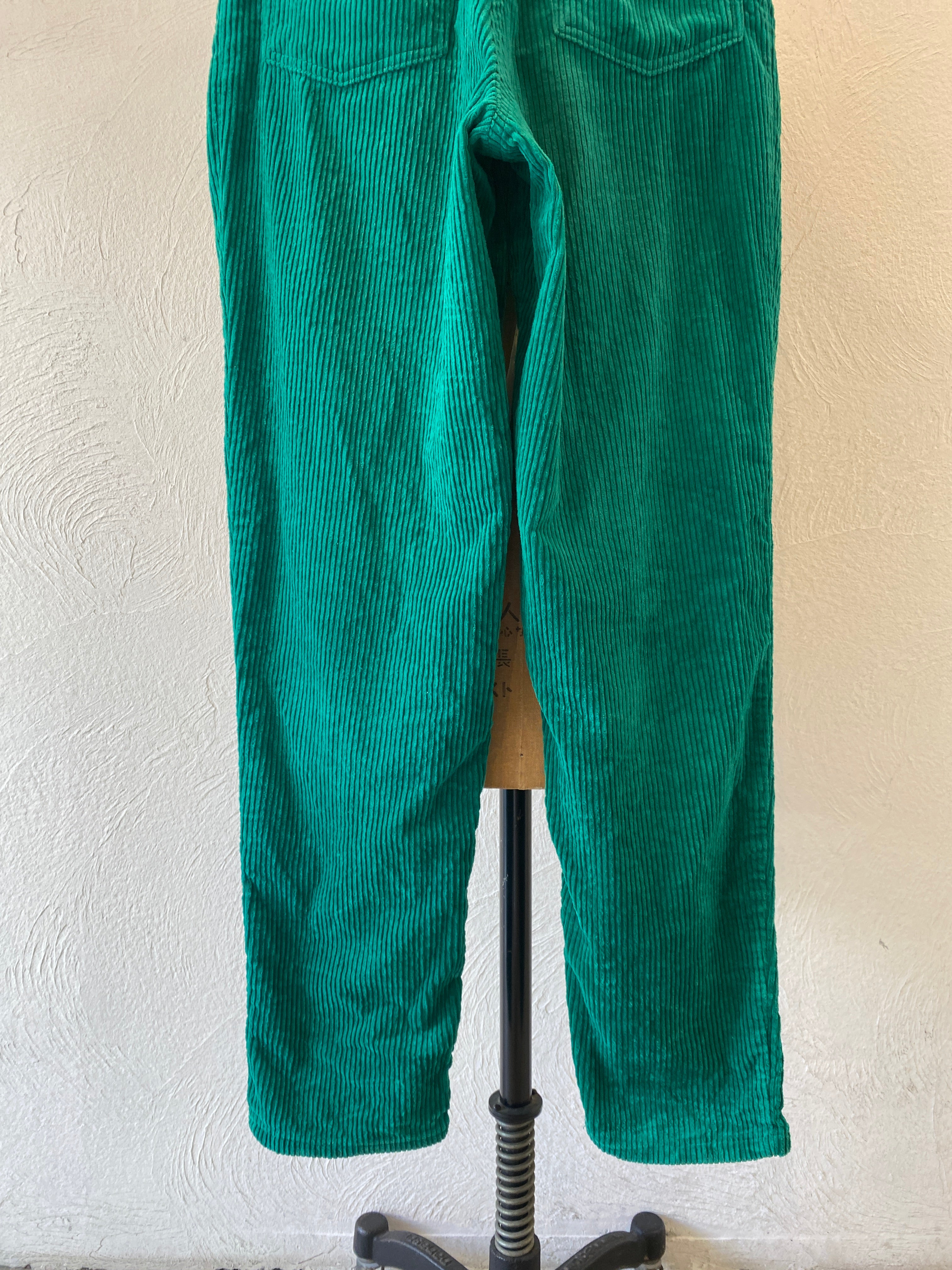 green corduroy pants