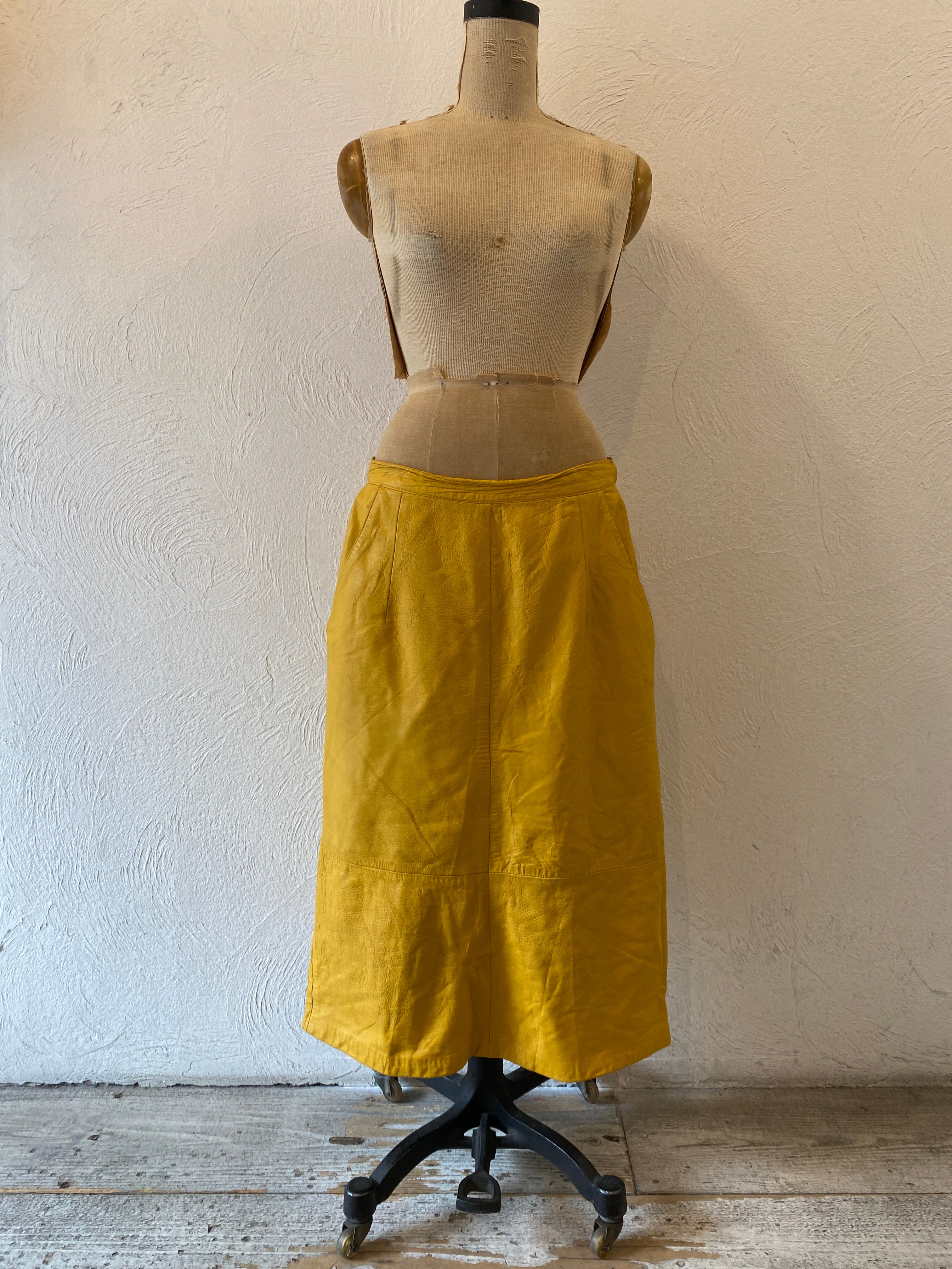 yellow leather skirt