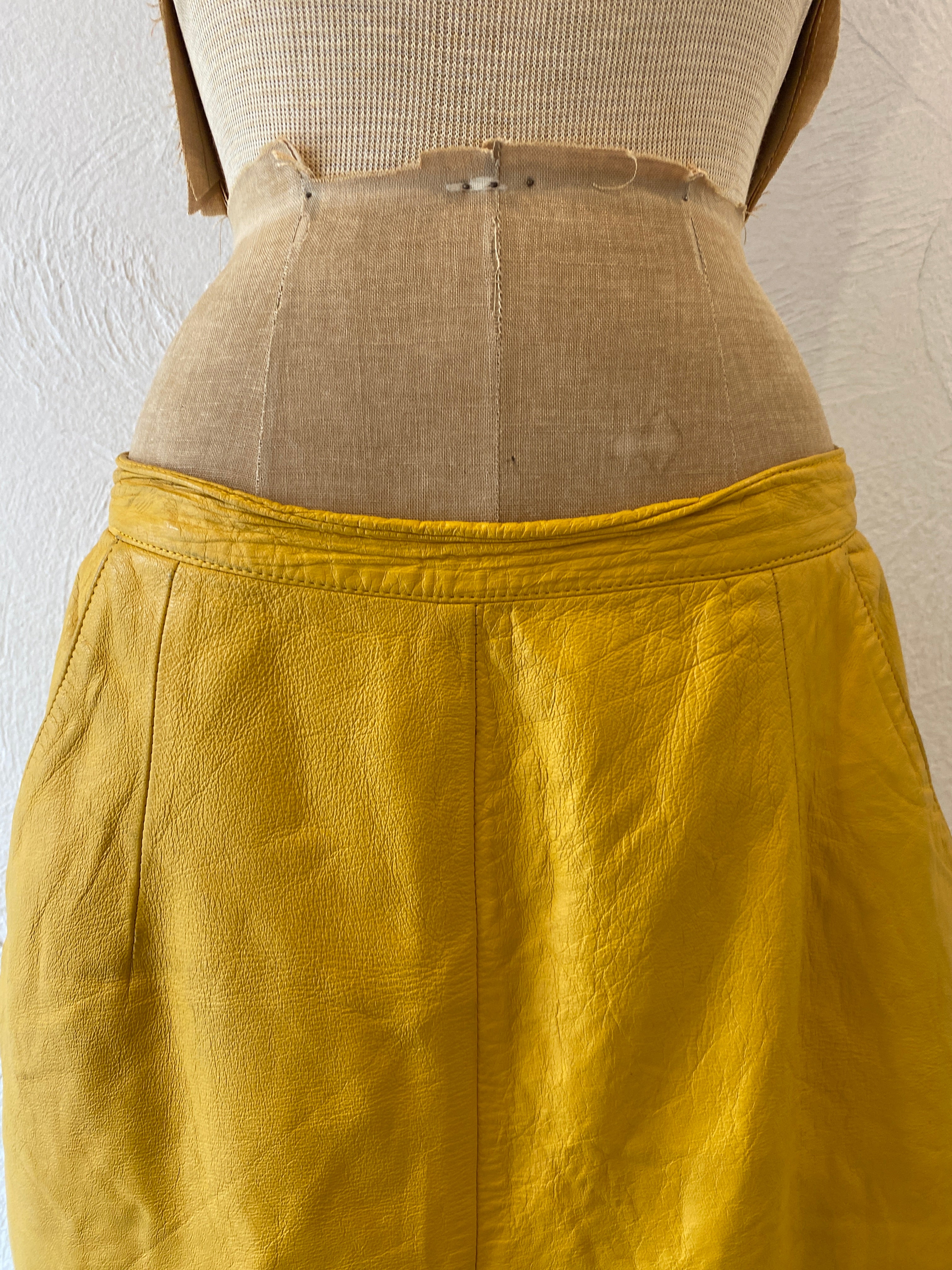 yellow leather skirt