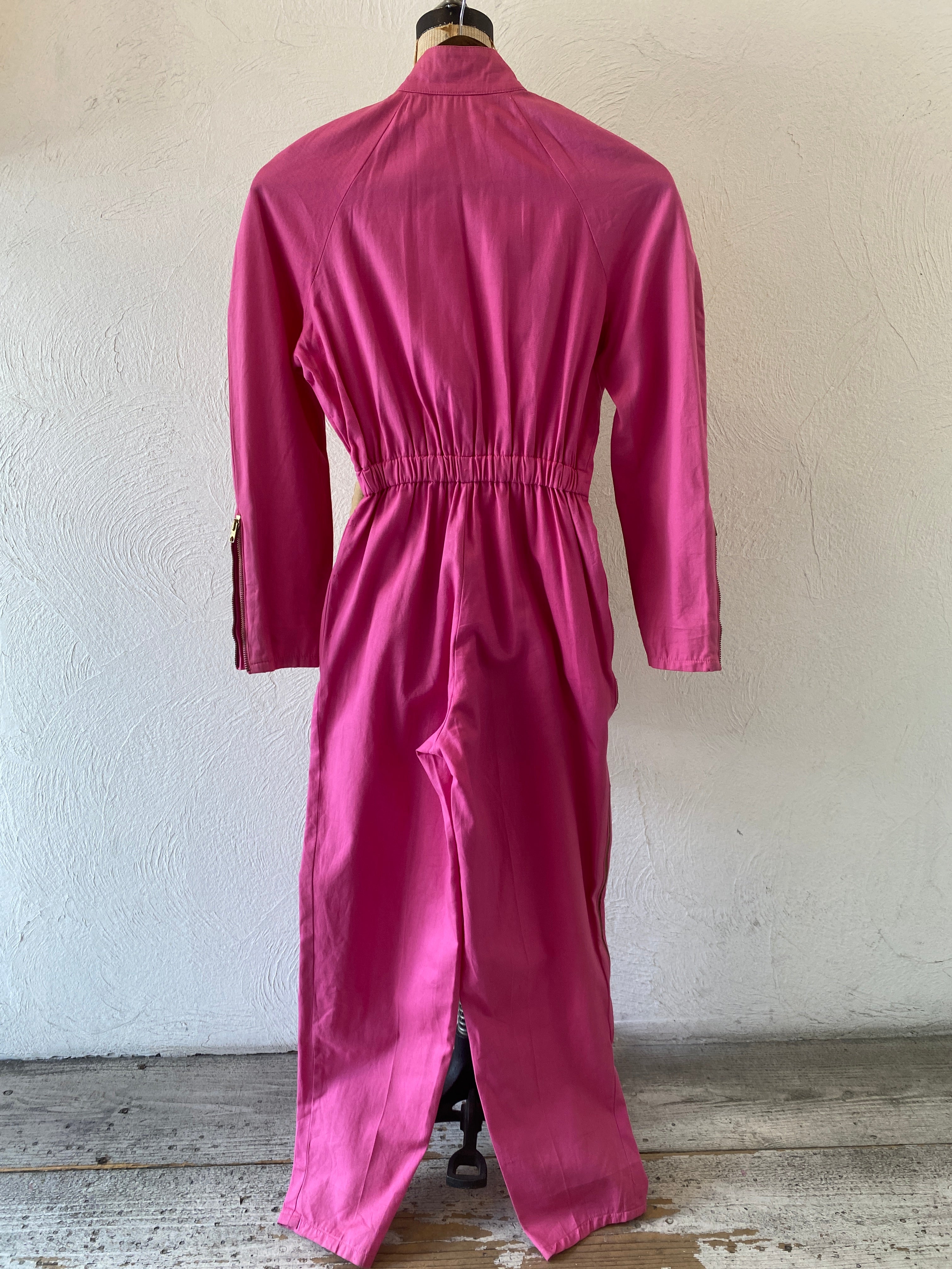 zip pink jump suit