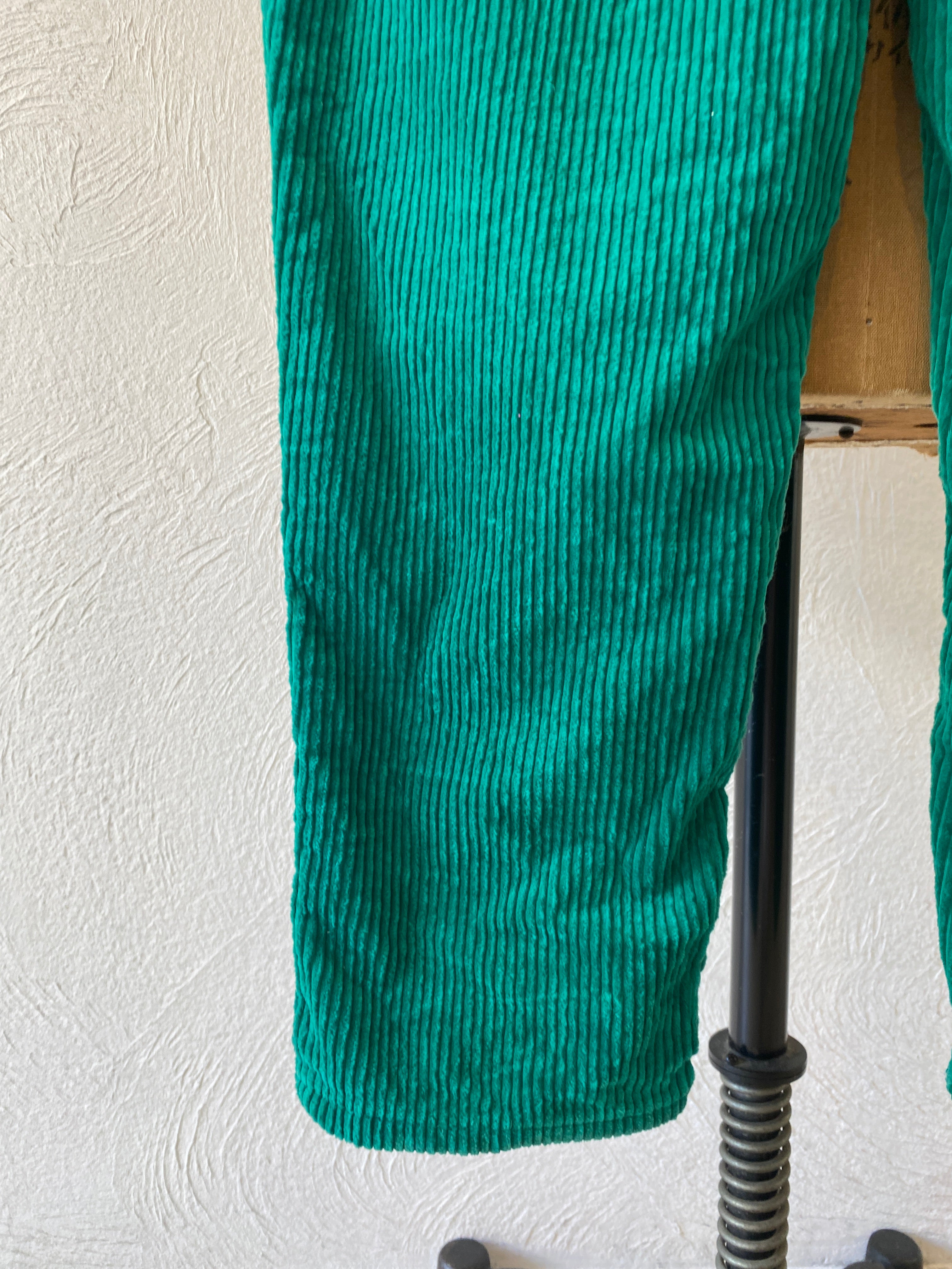 green corduroy pants