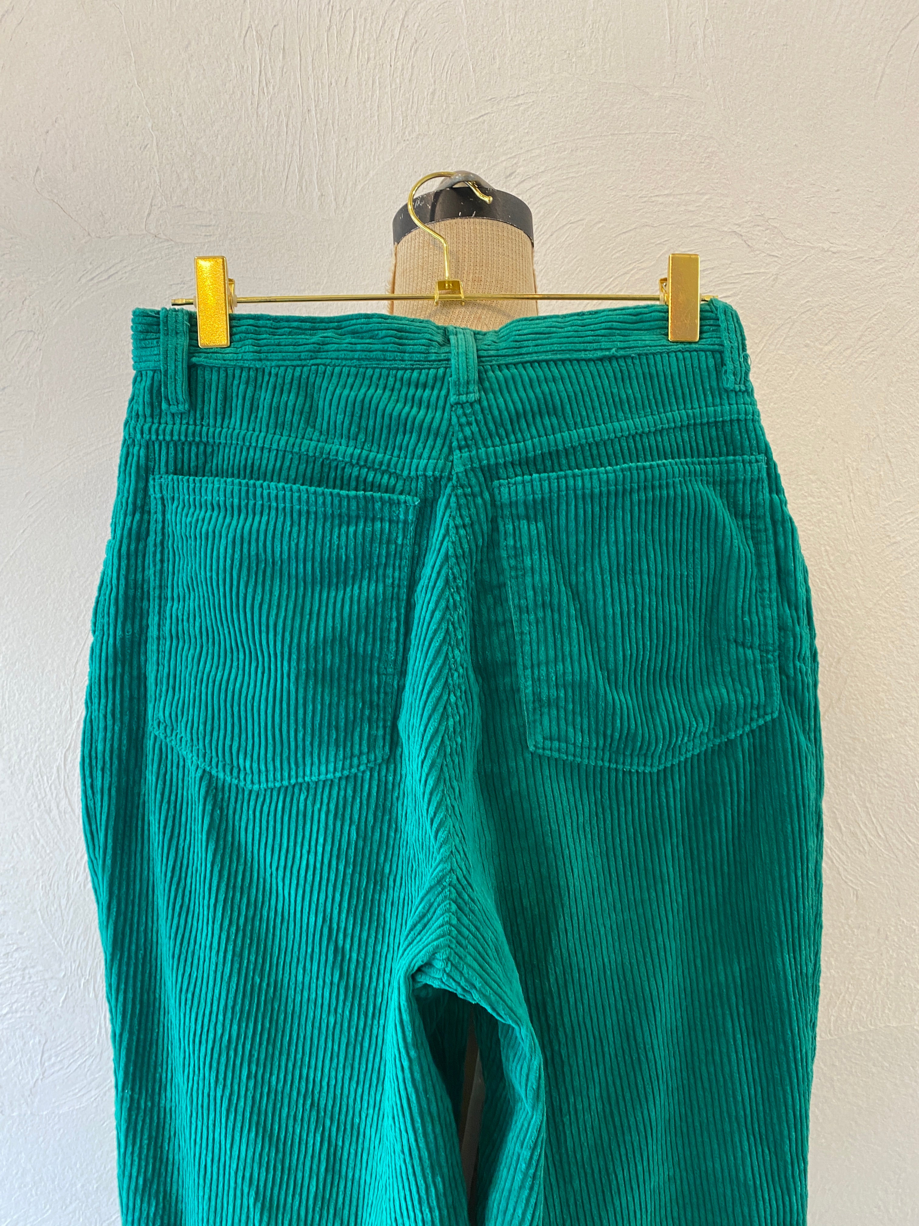 green corduroy pants