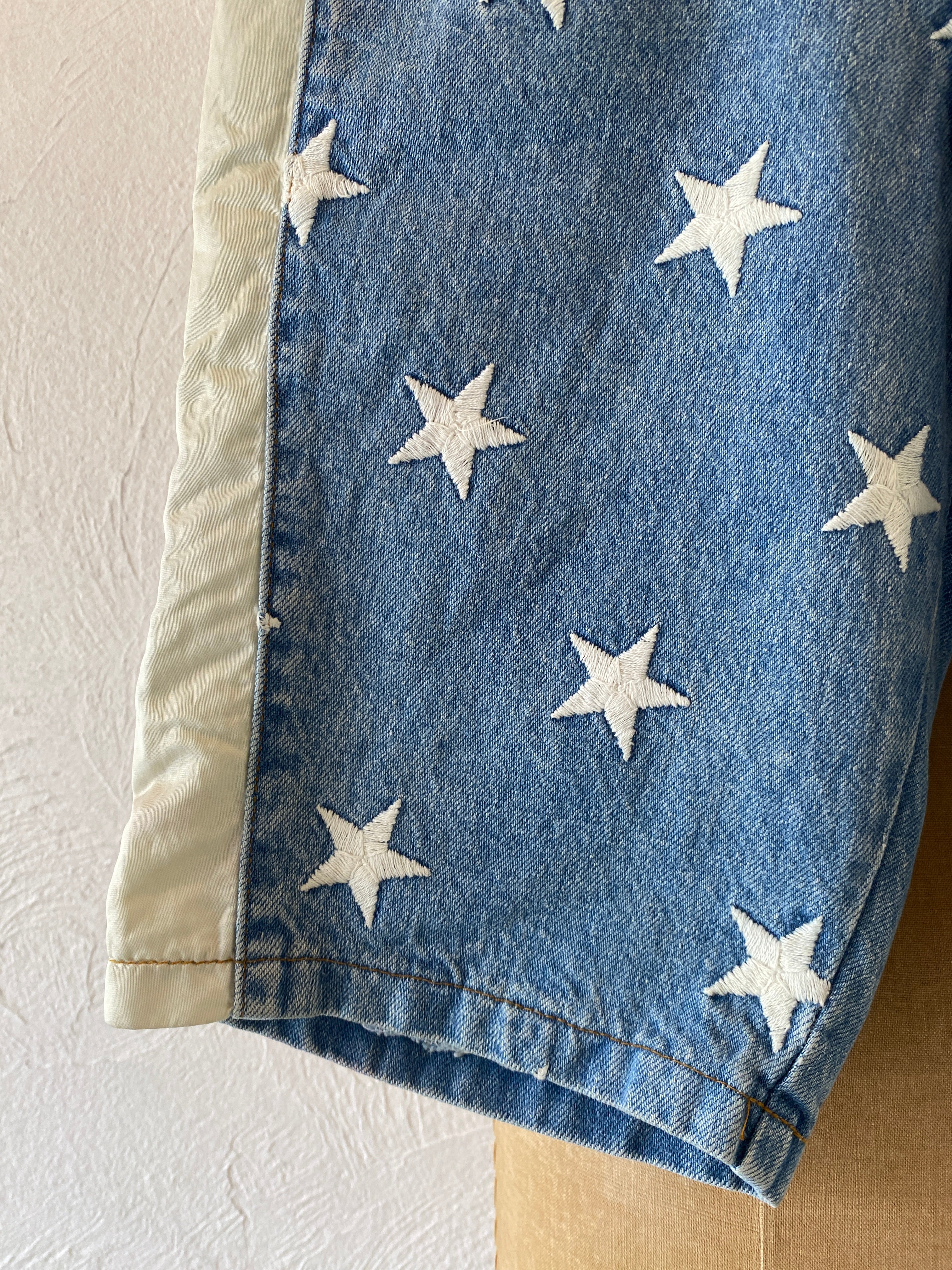 star embroidery denim pants