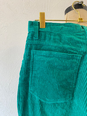 green corduroy pants