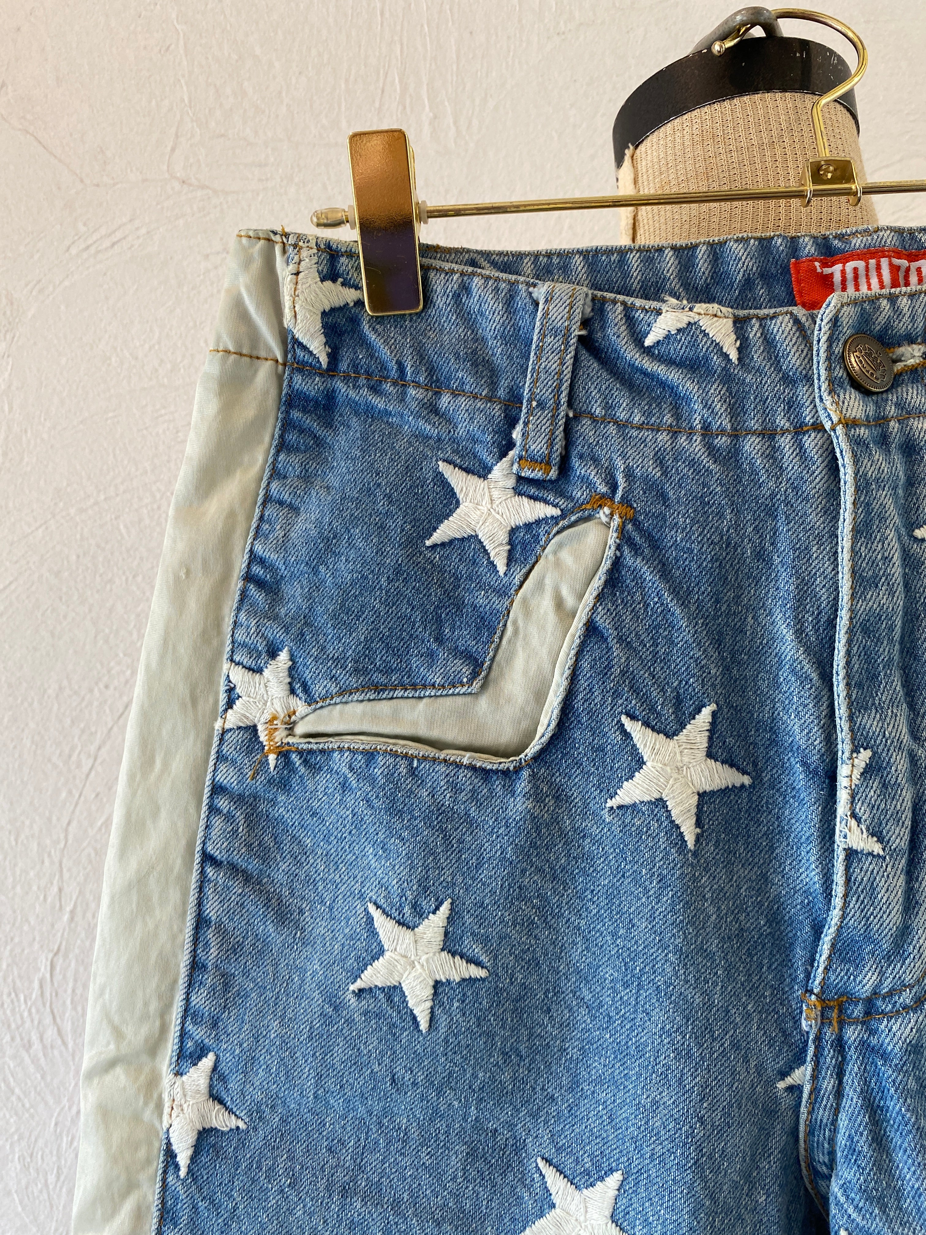 star embroidery denim pants