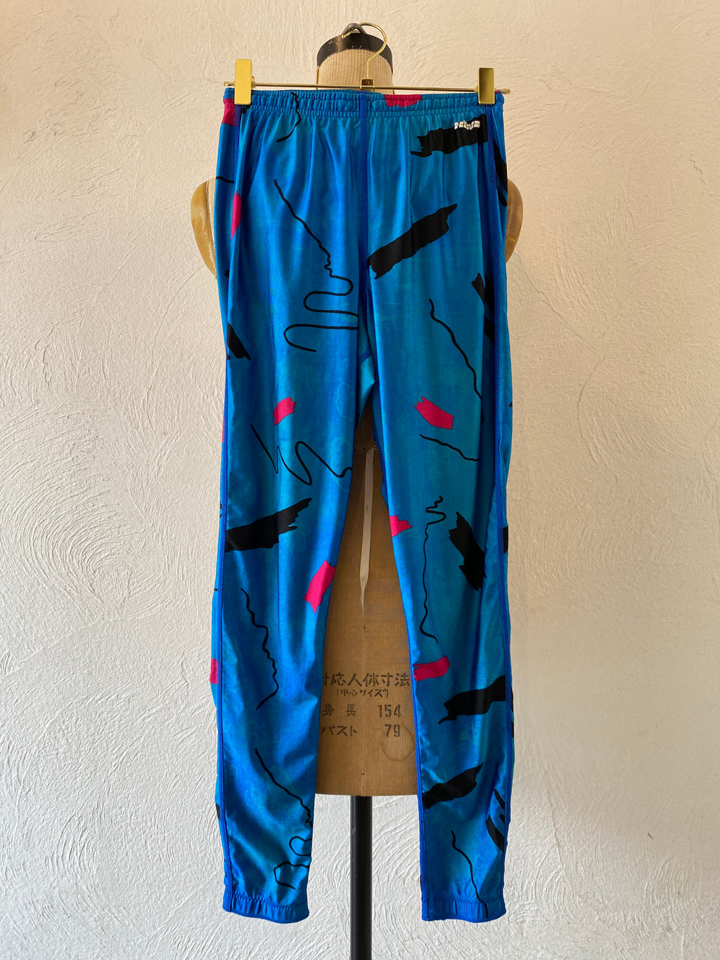 shiny blue cycling pants