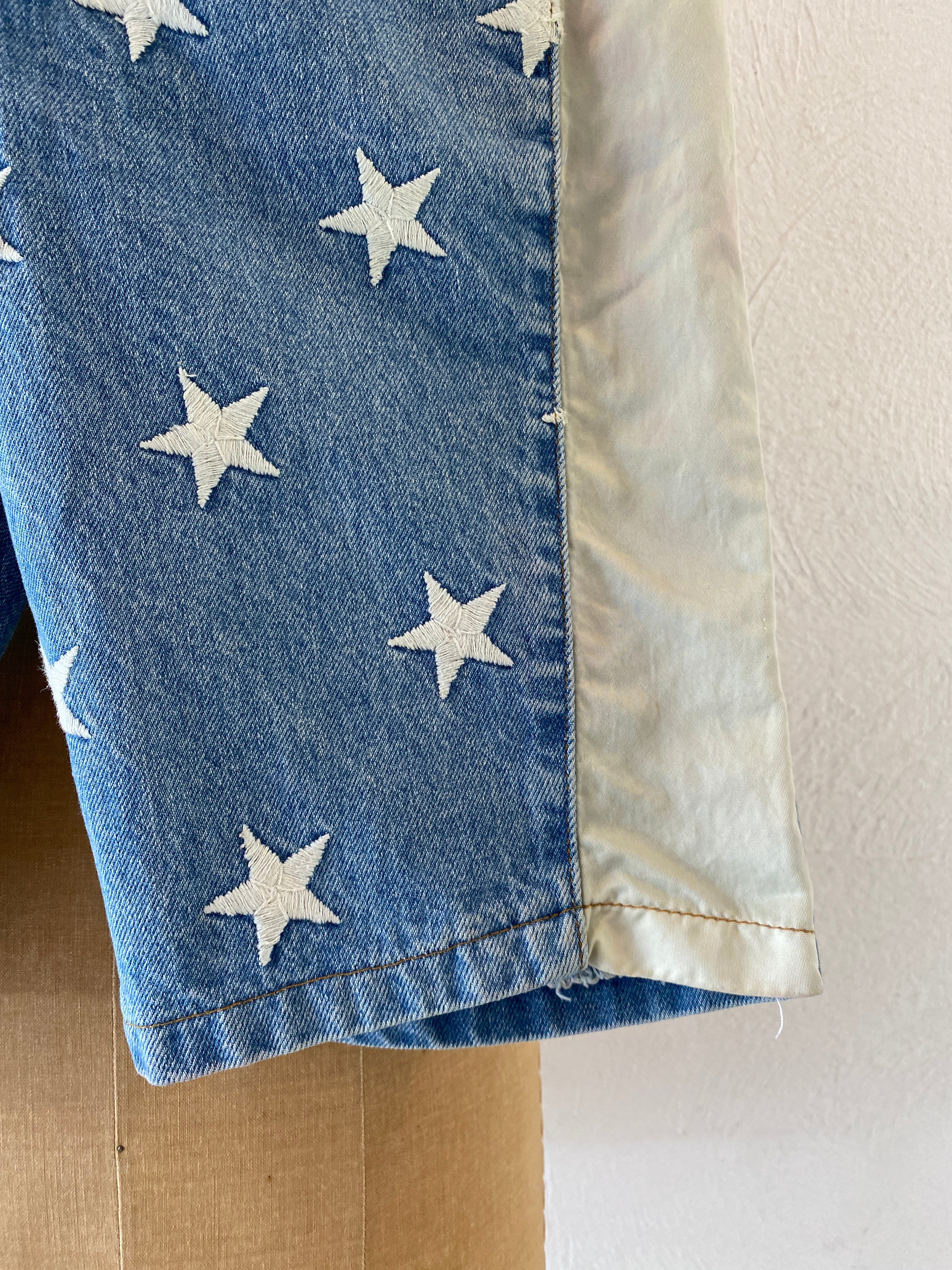 star embroidery denim pants