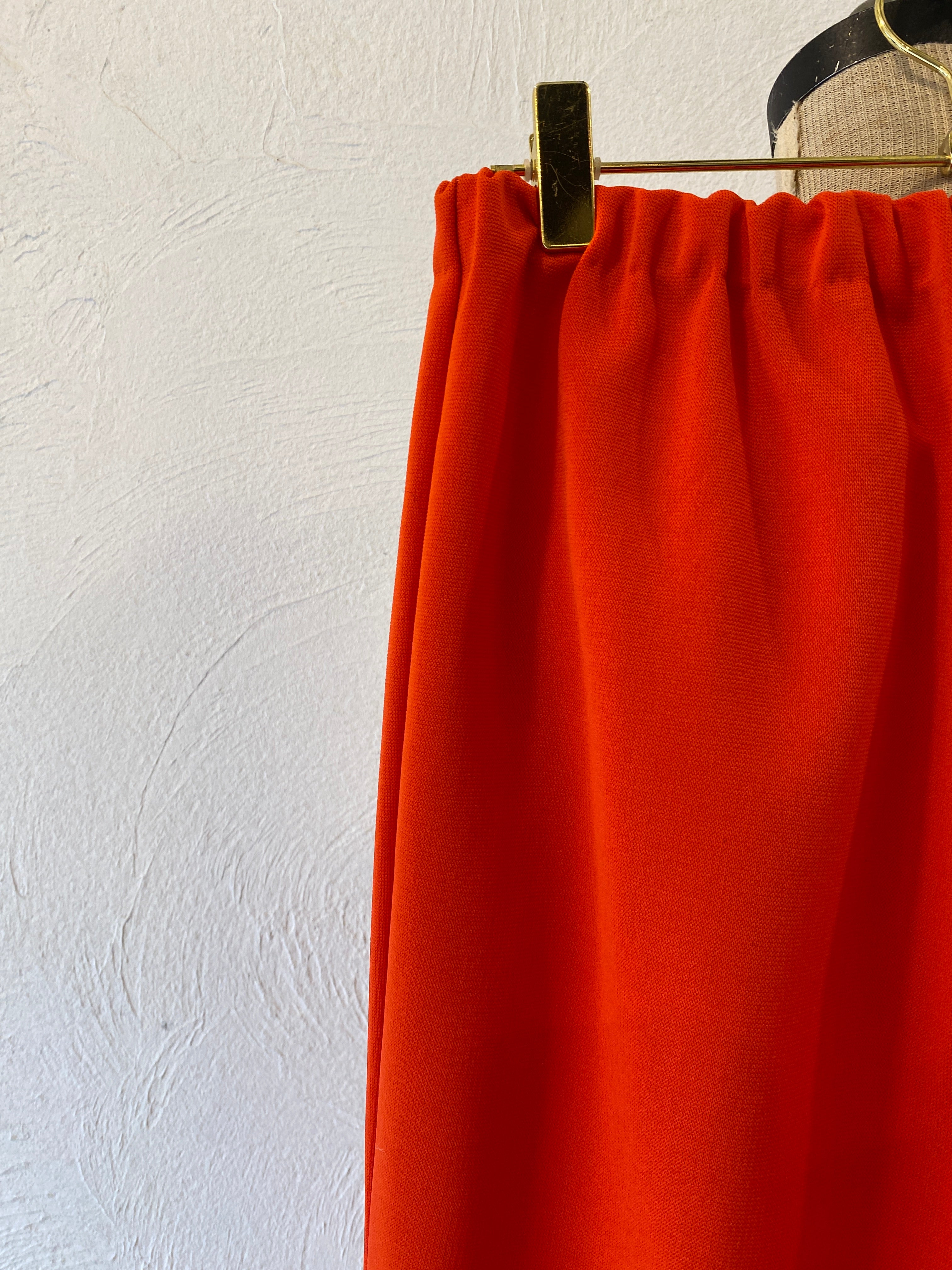 orange ester pants