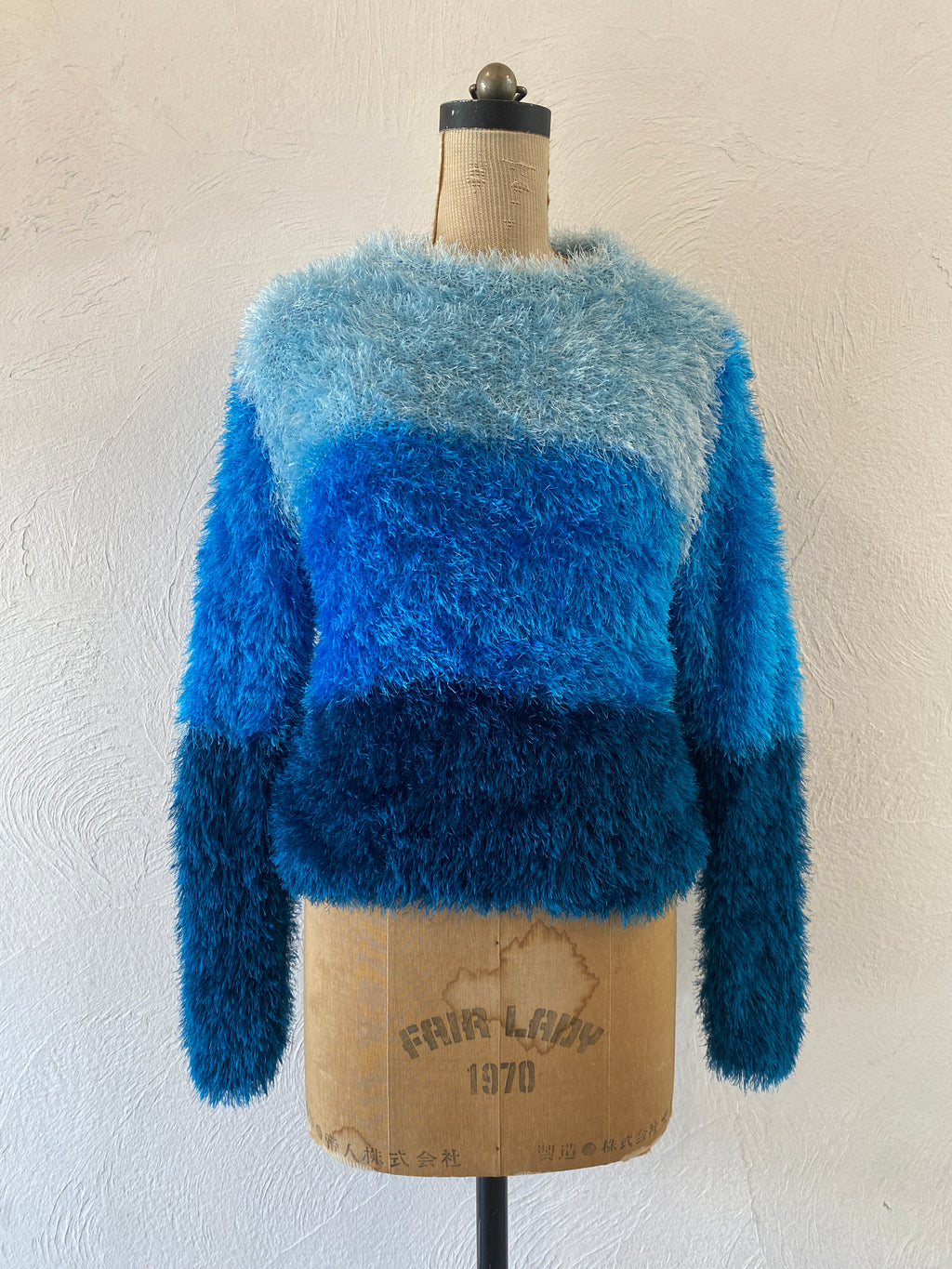 blue border shaggy knit