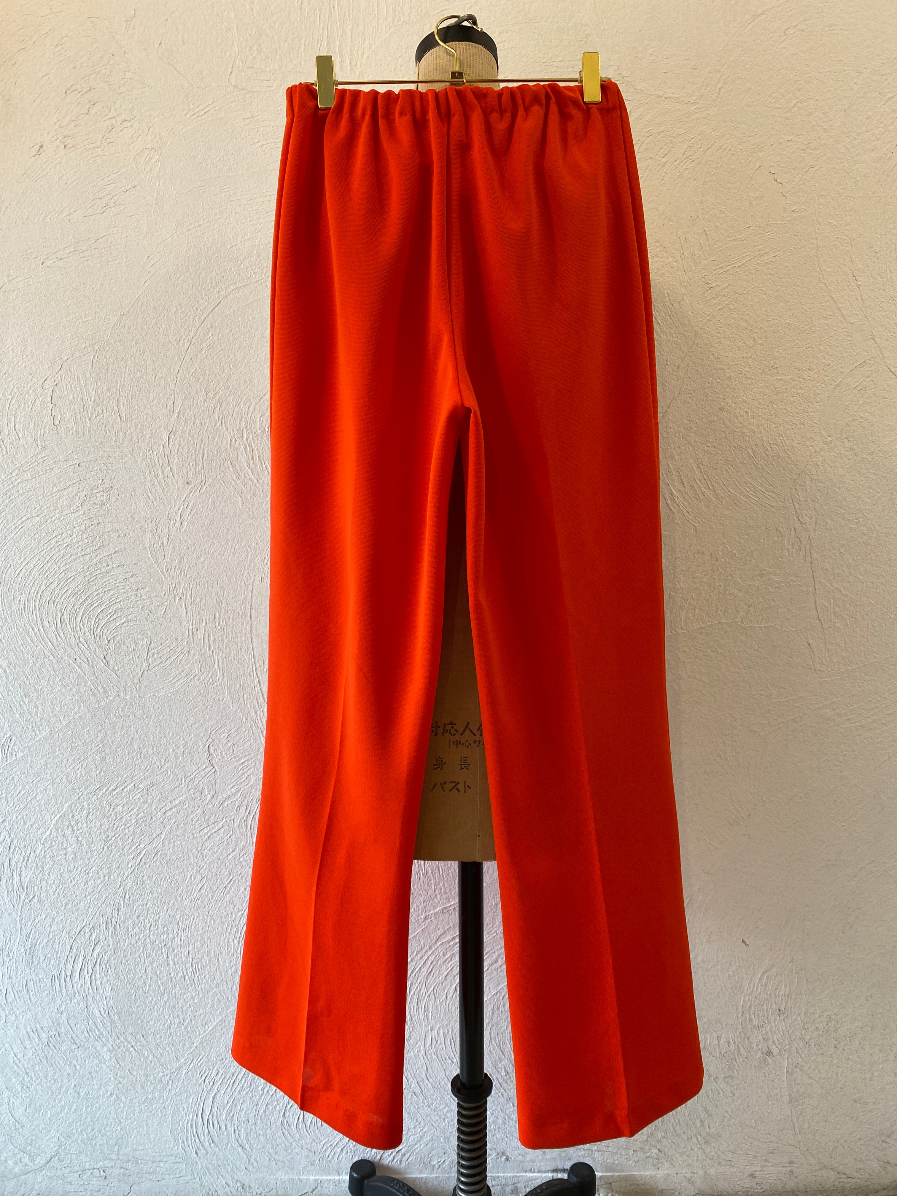 orange ester pants