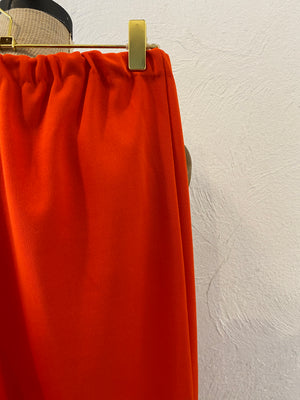 orange ester pants