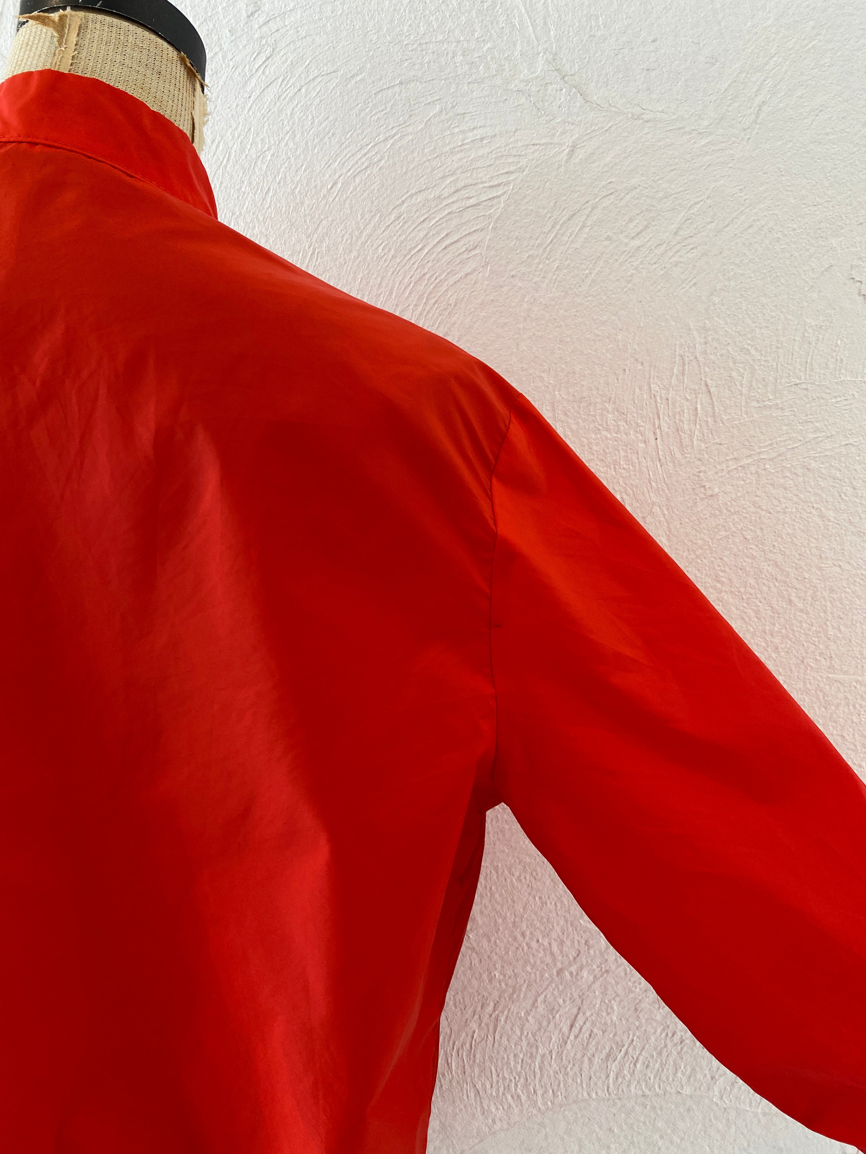 red nylon jacket