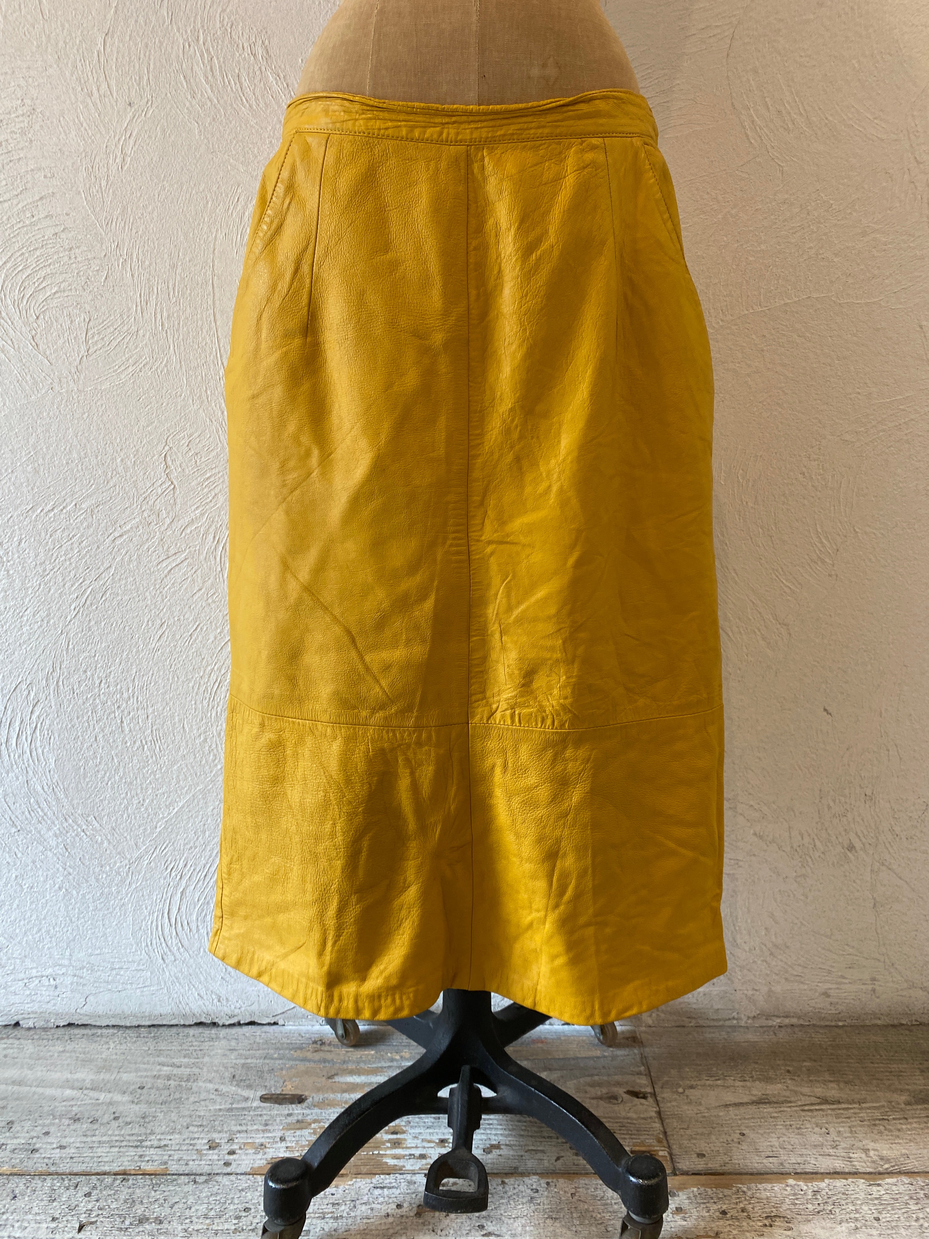 yellow leather skirt