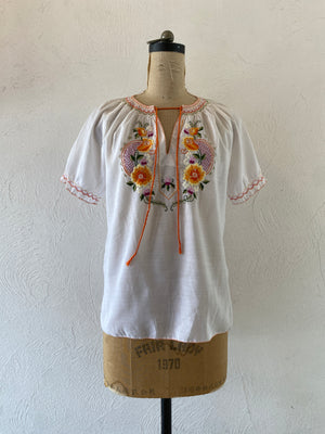 orange embroidery blouse