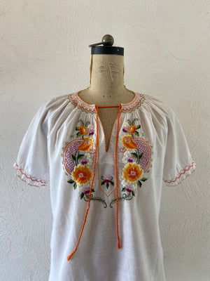 orange embroidery blouse