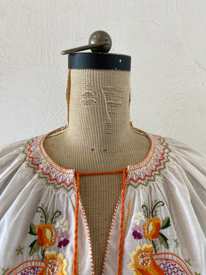 orange embroidery blouse