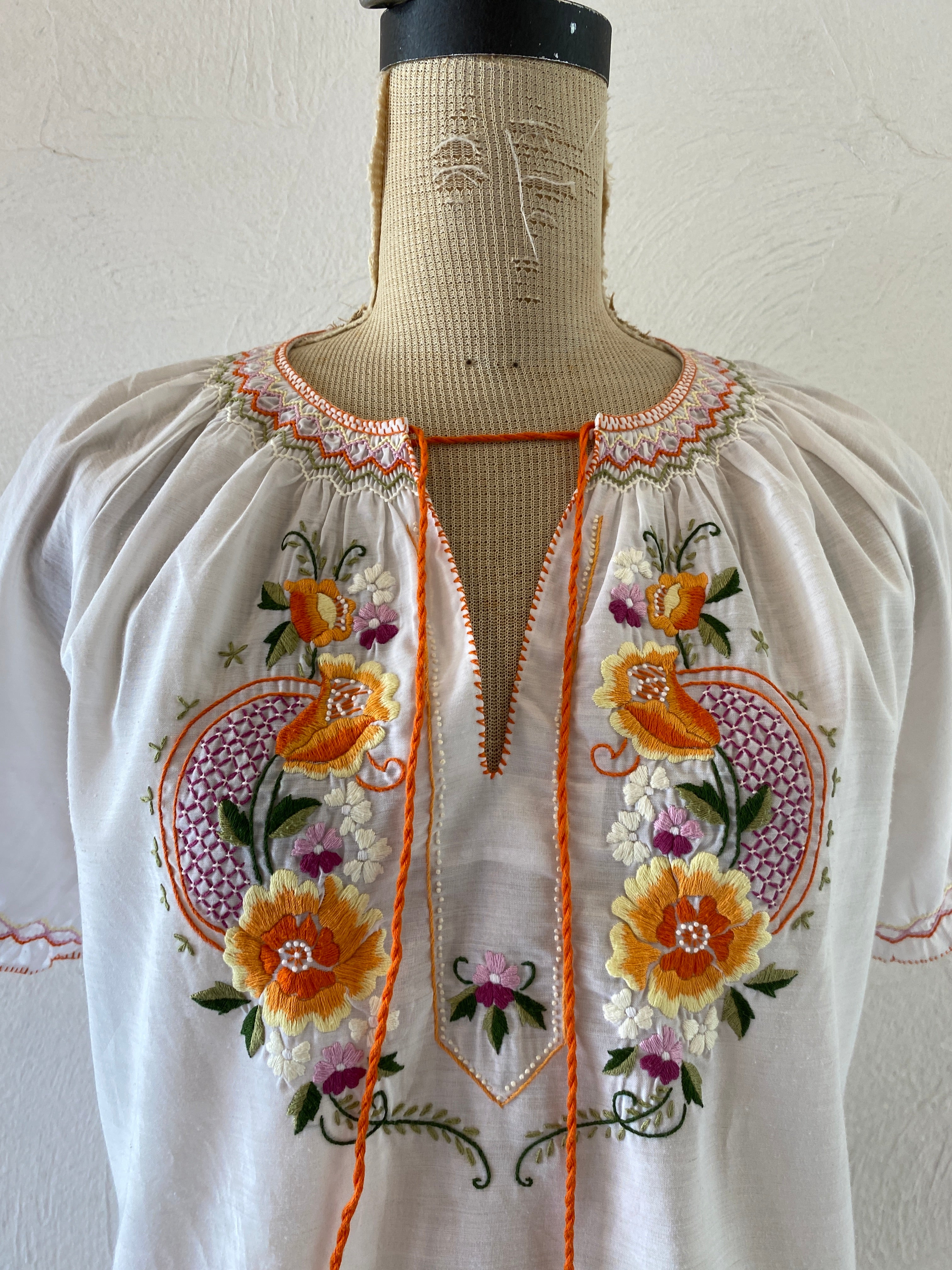 orange embroidery blouse