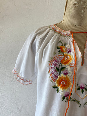 orange embroidery blouse