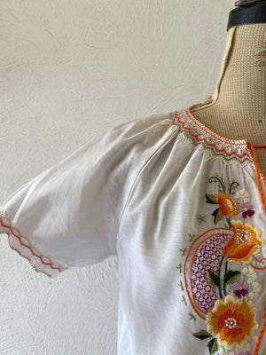 orange embroidery blouse