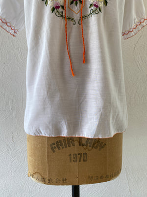 orange embroidery blouse