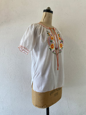 orange embroidery blouse