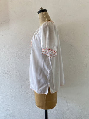 orange embroidery blouse