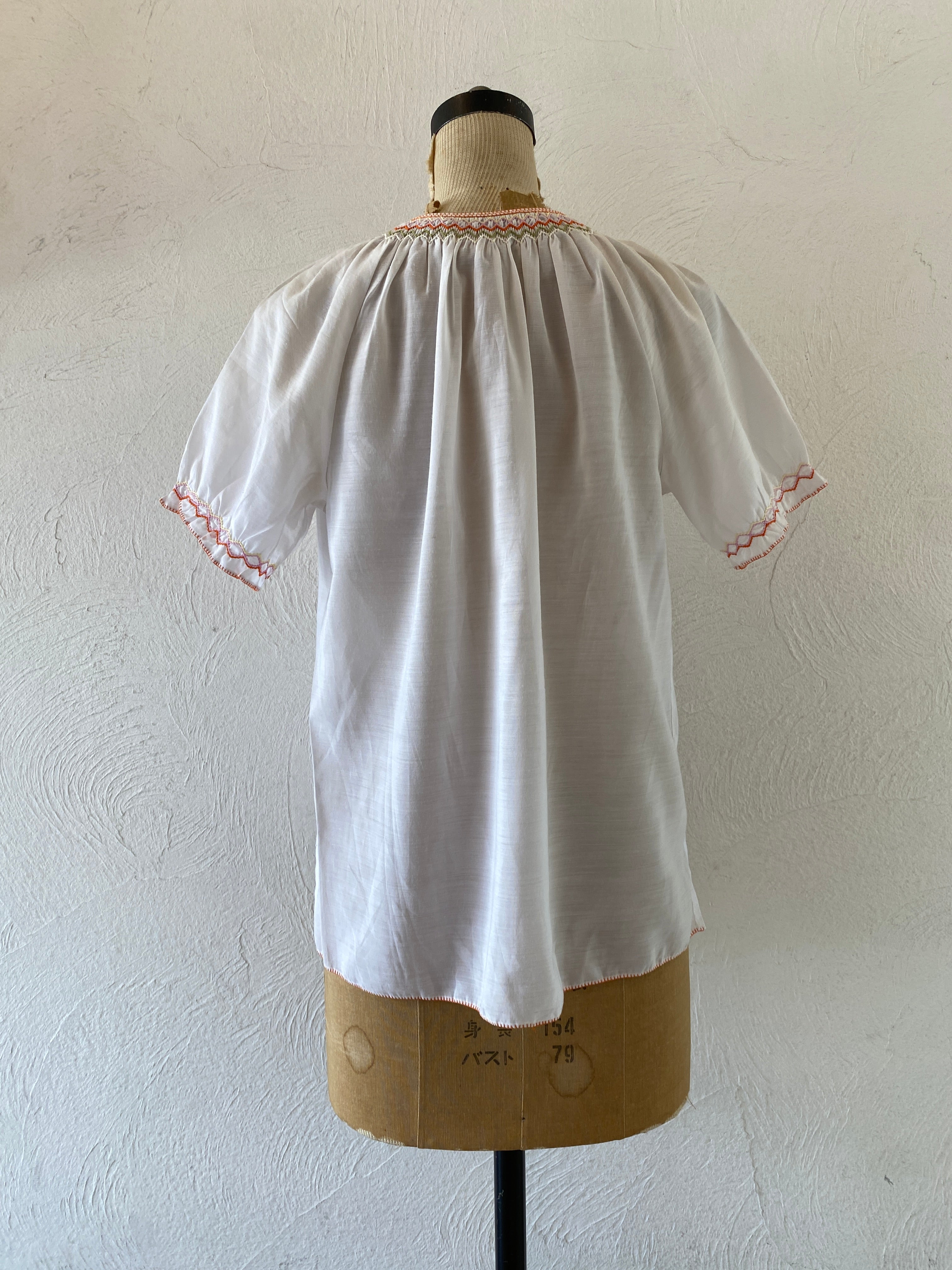 orange embroidery blouse