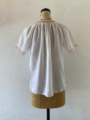 orange embroidery blouse