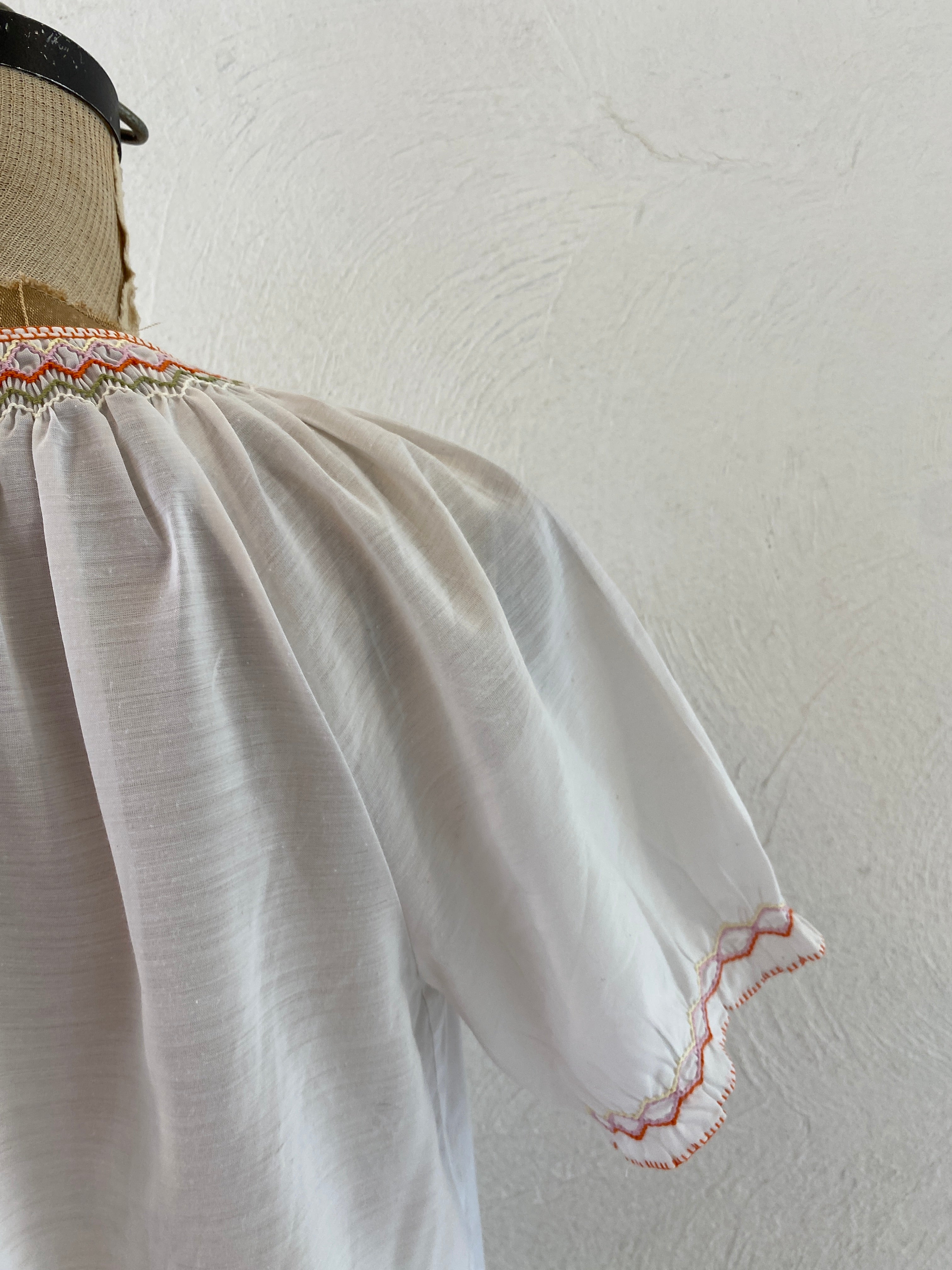 orange embroidery blouse