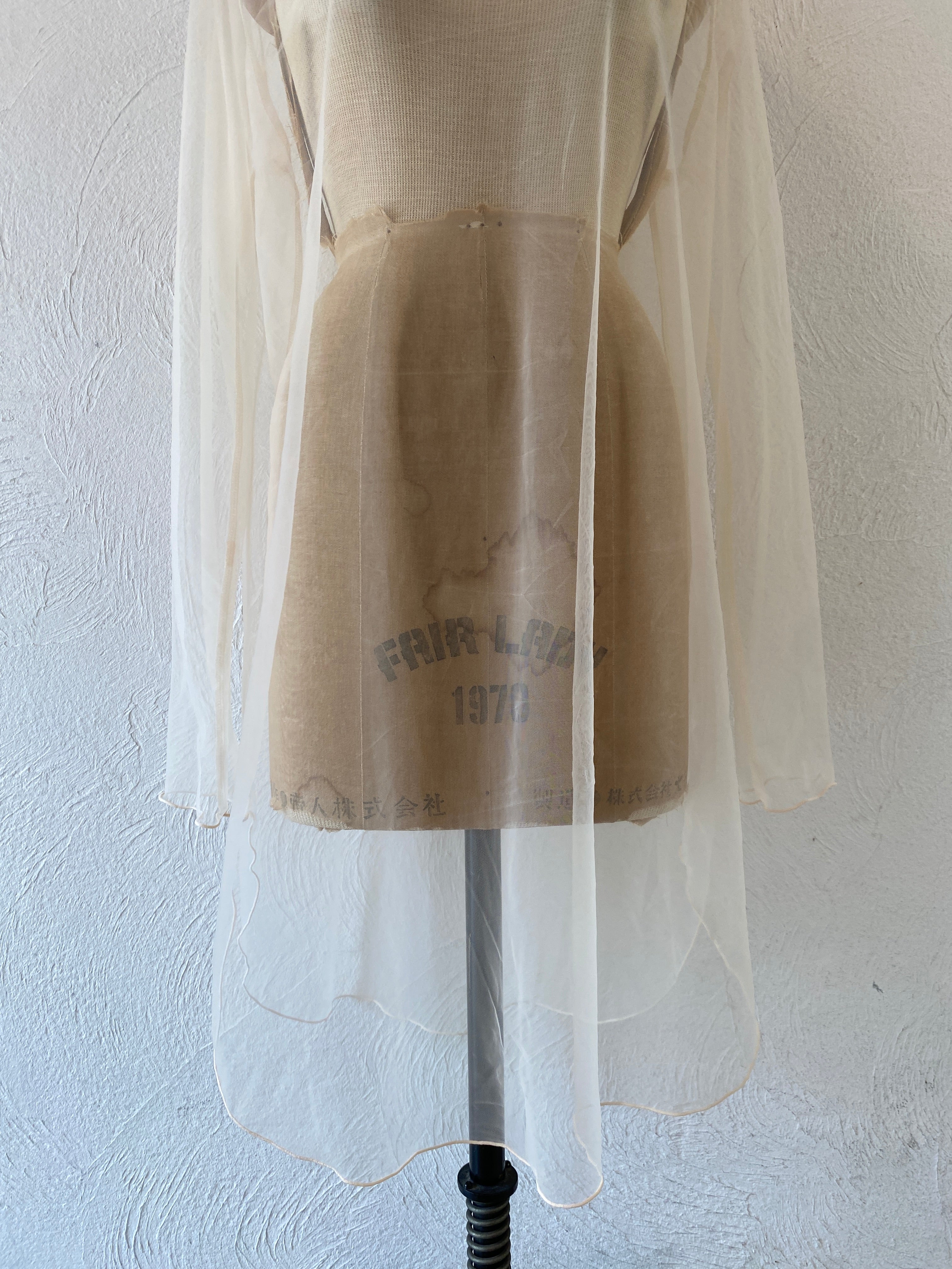 nude through dress